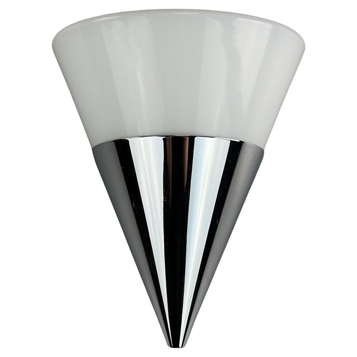 Applique forme flambeau en acier inoxydable. Coloris : nickel brossé