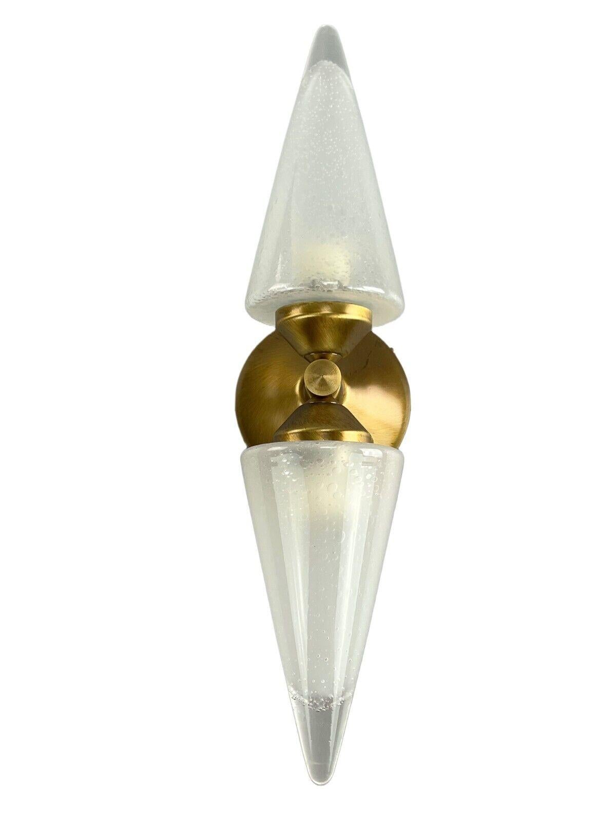 60s 70s Lamp light wall lamp wall sconce honsel glass Space Age Design

Object: wall lamp

Manufacturer: Honzel

Condition: good

Age: around 1960-1970

Dimensions:

Width = 11cm
Depth = 12.5cm
Height = 41cm

Other notes:

2x E14