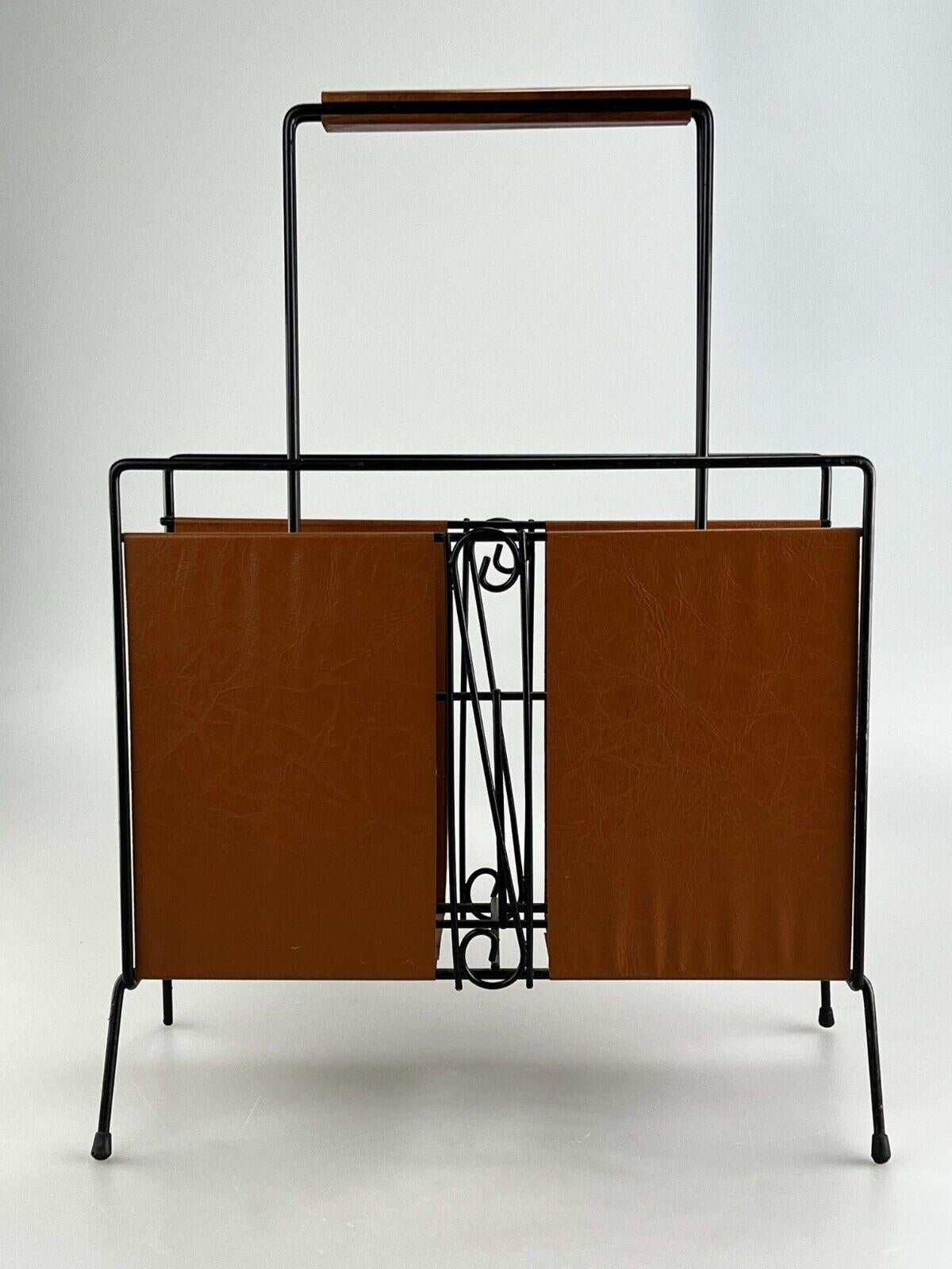 60's 70's Newspaper Holder Newspaper Rack Metal Teak Mid Century Design

Object: newspaper stand

Manufacturer:

Condition: good

Age: around 1960-1970

Dimensions:

36.5cm x 14cm x 51cm

Other notes:

The pictures serve as part of