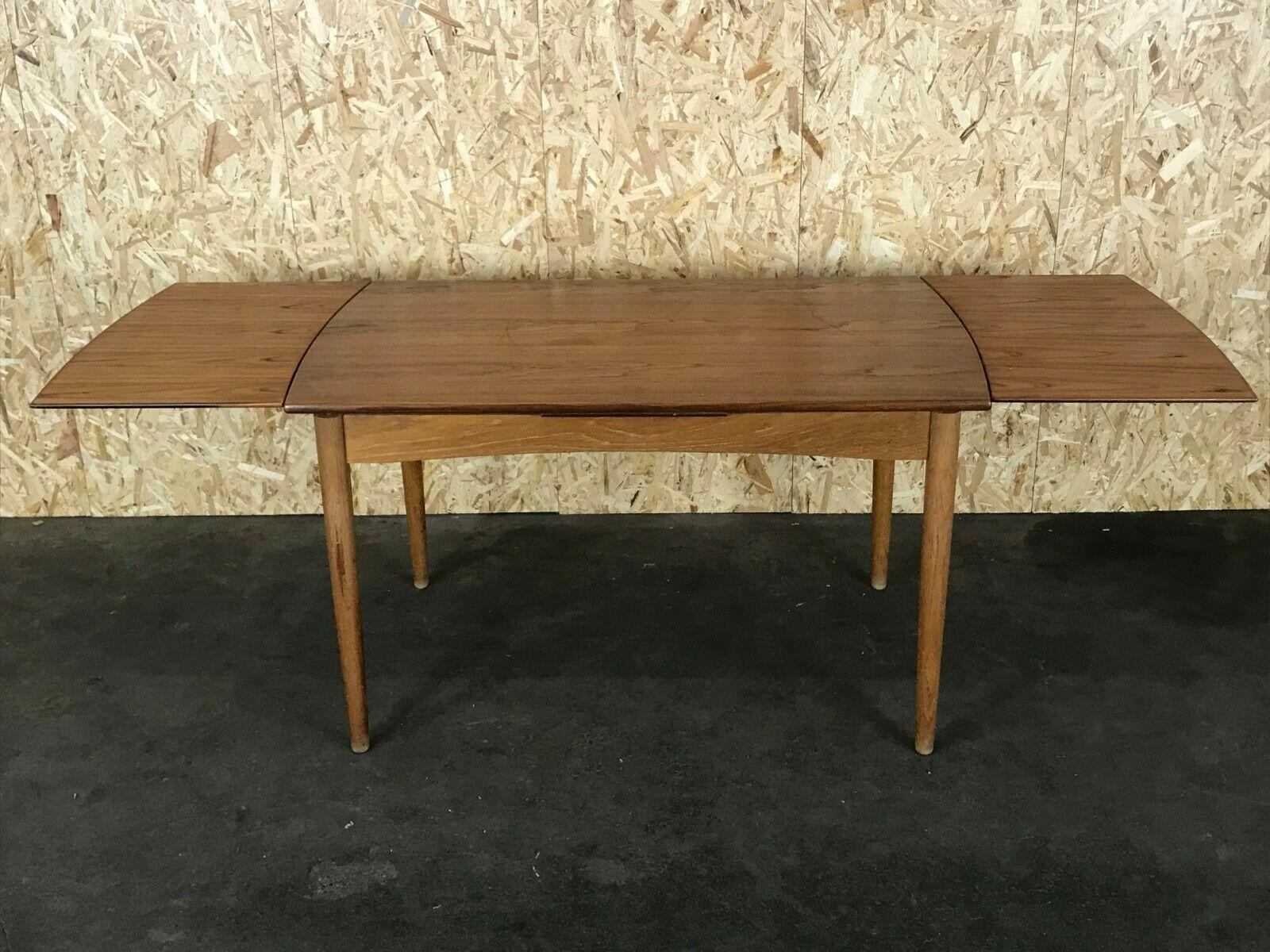 60s 70s oak teak dining table Danish Modern Design Denmark 60s

Object: dining table / dining table

Manufacturer:

Condition: good - vintage

Age: around 1960-1970

Dimensions:

(+ 2x 45cm) 129.5cm x 83cm x 75cm

Other notes:

The