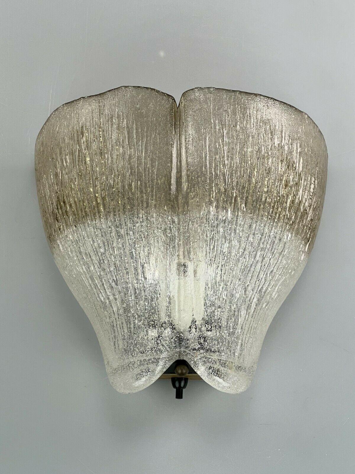 60s 70s Peill & Putzler wall lamp glass space design lamp 60s.

Object: lamp

Manufacturer: Peill & Putzler

Condition: good

Age: around 1960-1970

Dimensions:

26.5cm x 24.5cm x 15cm

Other notes:

The pictures serve as part of the