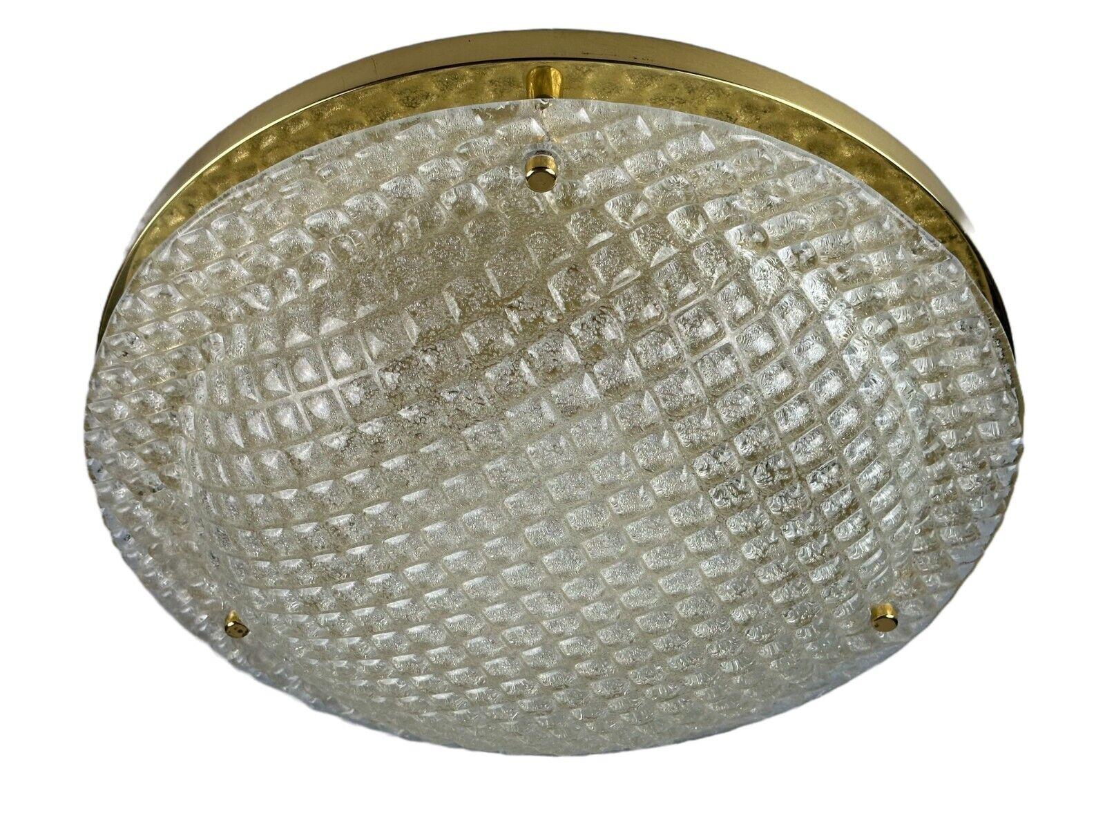 60s 70s Plafoniere ceiling lamp by Fischer Leuchten Germany Space Age

Object: Plafoniere

Manufacturer: Fischer Leuchten

Condition: good

Age: around 1960-1970

Dimensions:

Diameter = 50cm
Height = 14cm

Other notes:

3x E27 socket

The pictures