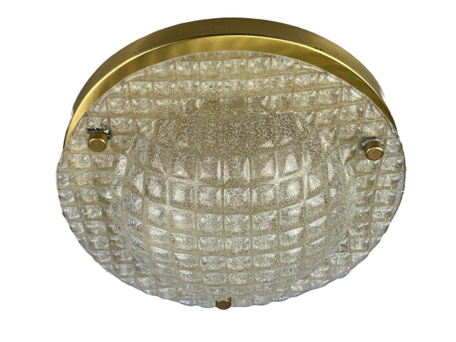 60s 70s Plafoniere ceiling lamp by Fischer Leuchten Germany Space Age

Object: Plafoniere

Manufacturer: Fischer Leuchten

Condition: good

Age: around 1960-1970

Dimensions:

Diameter = 30cm
Height = 12cm

Material: Glass & Metal

Other notes:

E27