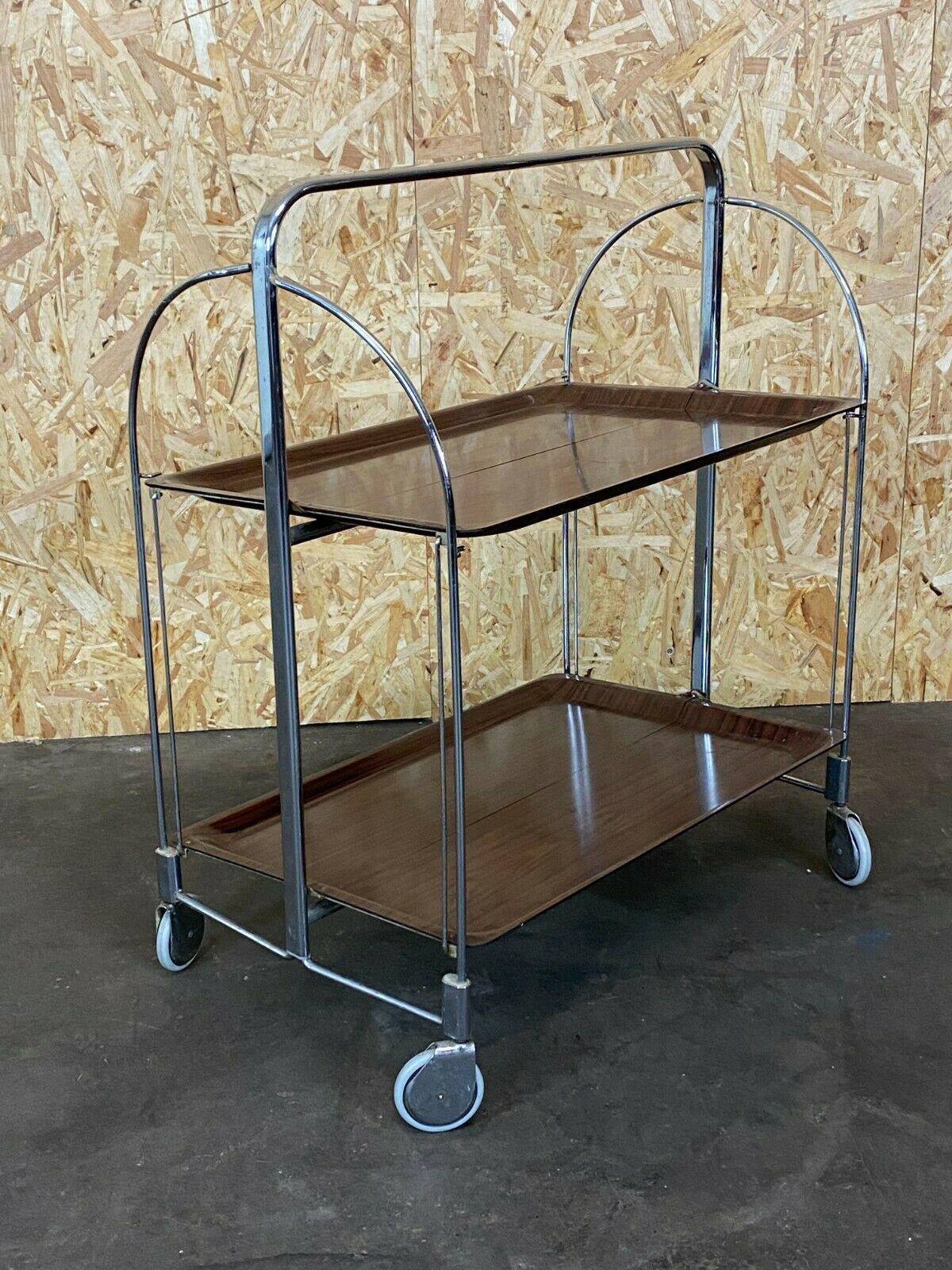 60s 70s serving trolley Dinett side table space age brown design 60s 70s

Object: Serving trolley

Manufacturer:

Condition: good

Age: around 1960-1970

Dimensions:

68cm x 42cm x 72cm

Other notes:

The pictures serve as part of