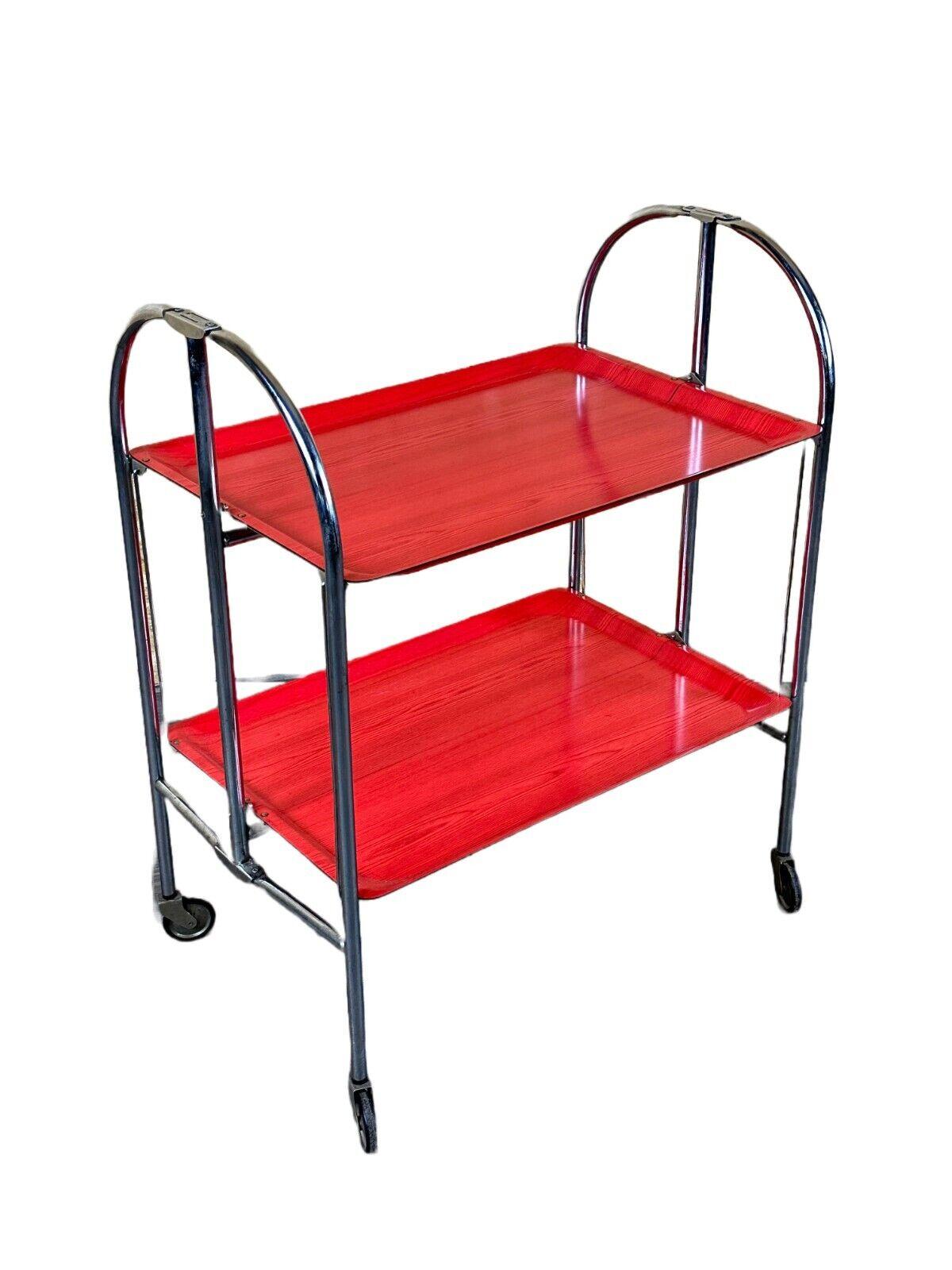 60s 70s serving trolley dinette side table space age red design

Object: serving trolley

Manufacturer:

Condition: good - vintage

Age: around 1960-1970

Dimensions:

Width = 65.5cm
Depth = 41cm
Height = 80cm

Material: metal, plastic

Other
