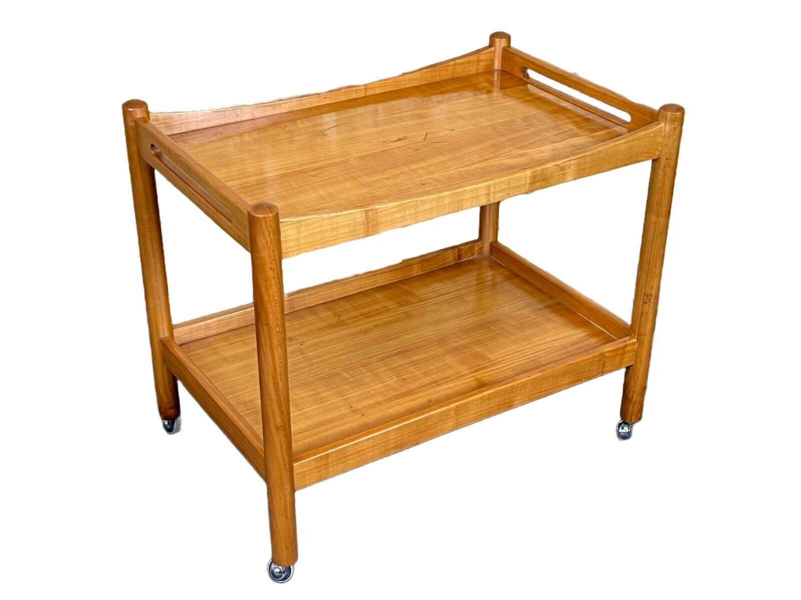 60s 70s Serving trolley side table Danish Modern Design, Denmark.

Object: Serving trolley

Manufacturer:

Condition: good - vintage

Age: around 1960-1970

Dimensions:

Width = 73cm
Depth = 48cm
Height = 63cm

Other notes:

The