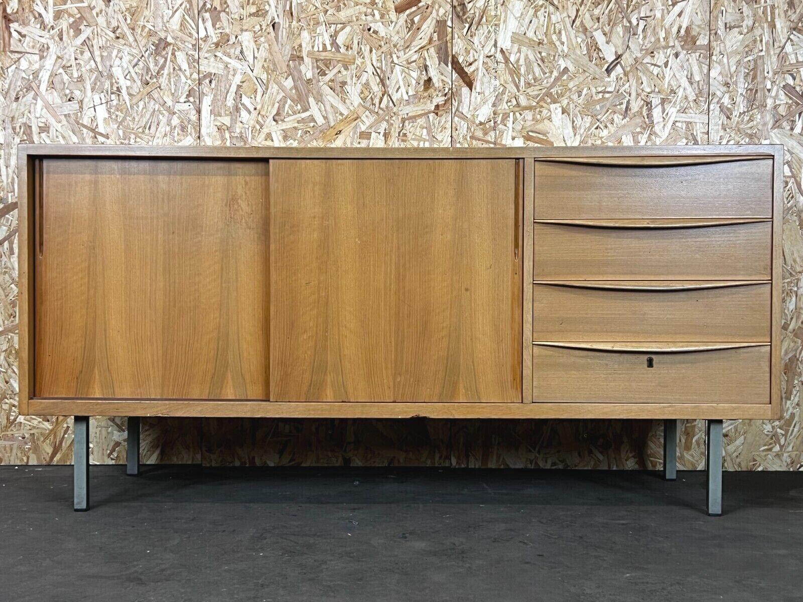 60s 70s sideboard Credenza cabinet Danish Modern Design Denmark 70s

Object: sideboard

Manufacturer:

Condition: good - vintage

Age: around 1960-1970

Dimensions:

150cm x 50cm x 74cm

Other notes:

The pictures serve as part of