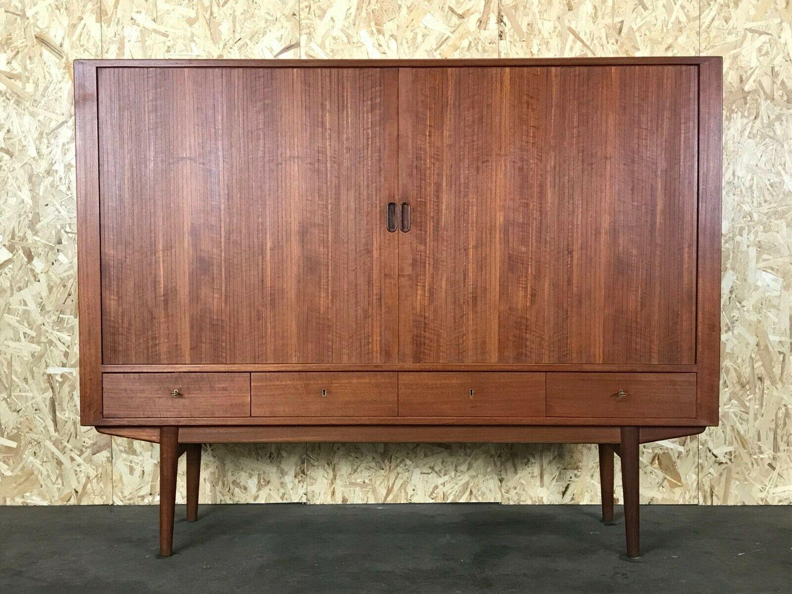 60s 70s sideboard highboard teak Arne Vodder Sibast model 54 design 60s

Object: high board

Manufacturer: Sibast

Condition: good

Age: around 1960-1970

Dimensions:

170cm x 44cm x 132.5cm

Other notes:

The pictures serve as part
