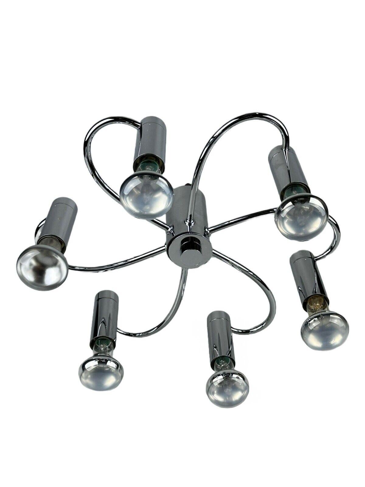 60s 70s Sputnik wall lamp or ceiling lamp by Cosack Leuchten Chrom

Object: ceiling lamp

Manufacturer: Cosack lights

Condition: good

Age: around 1960-1970

Dimensions:

Diameter = 35cm
Height = 14cm

Other notes:

6x E14 socket

The pictures