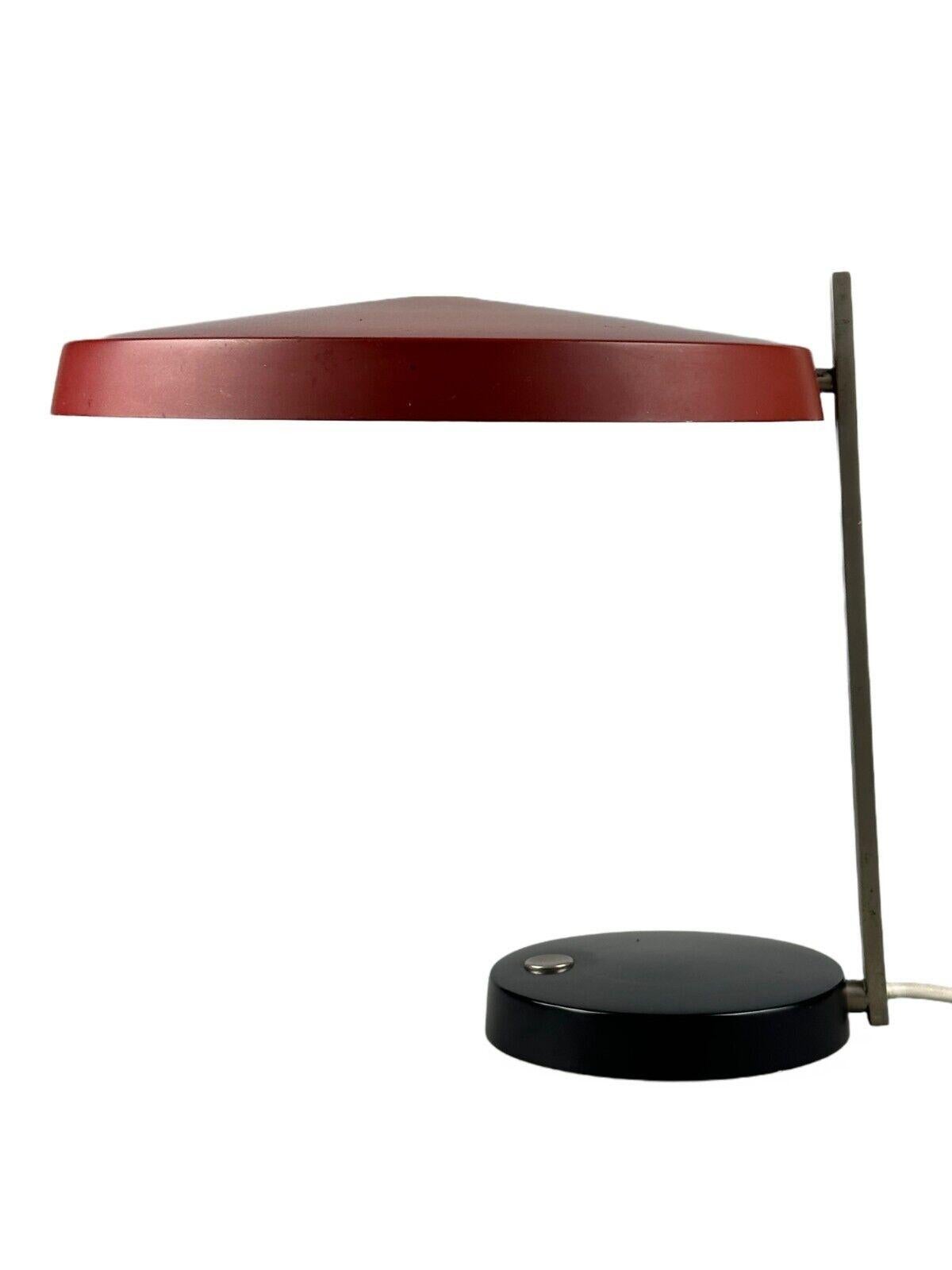 60s 70s table lamp desk lamp by Heinz Pfänder for Hillebrand

Object: table lamp

Manufacturer: Hillebrand

Condition: good

Age: around 1960-1970

Material: metal, plastic

Dimensions:

Width = 31.5cm
Depth = 30cm
Height = 30cm

Other notes:

2x