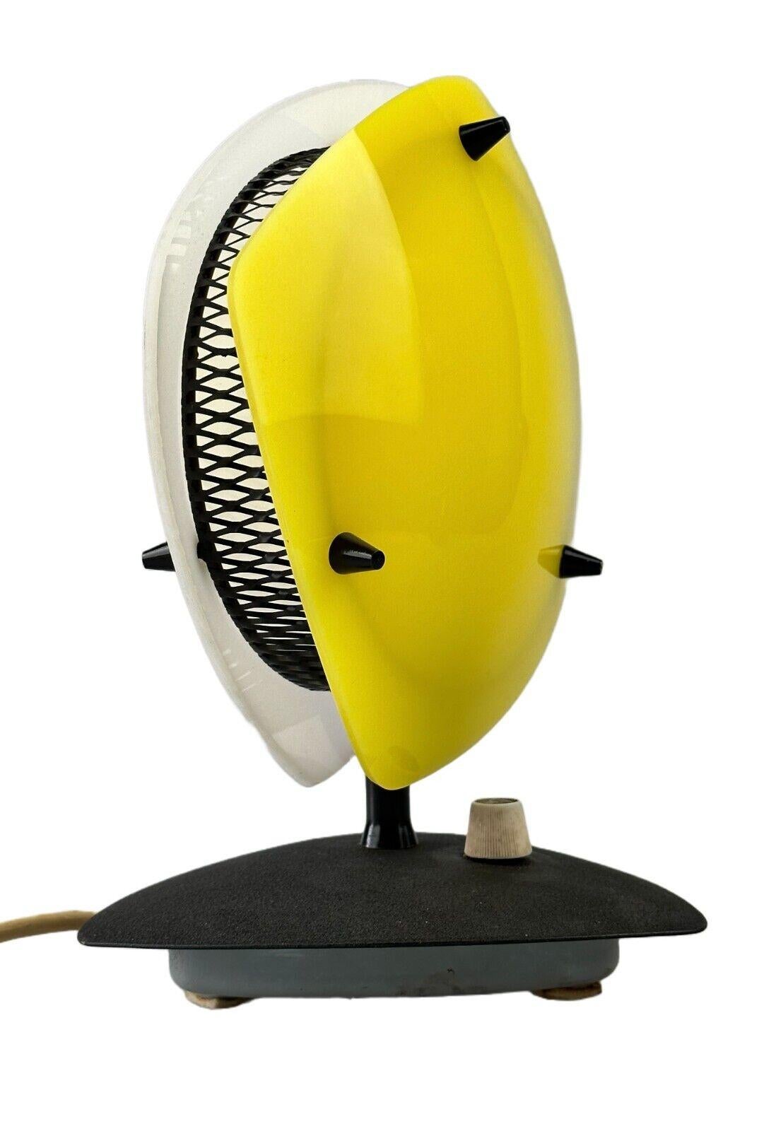 60s 70s table lamp plastic metal Sonnenkind Tele Ambiance France

Object: table lamp

Manufacturer: Tele Ambiance

Condition: good - vintage

Age: around 1960-1970

Dimensions:

Width = 20cm
Depth = 16cm
Height = 25cm

Other notes:

E14 socket

The