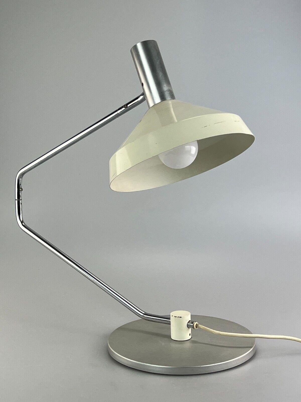 60s 70s table lamp Rosemarie and Rico Baltensweiler for Baltensweiler

Object: desk lamp

Manufacturer: Baltensweiler

Condition: good - vintage

Age: around 1960-1970

Dimensions:

50cm x 23.5cm x 47cm

Other notes:

The pictures serve as part of