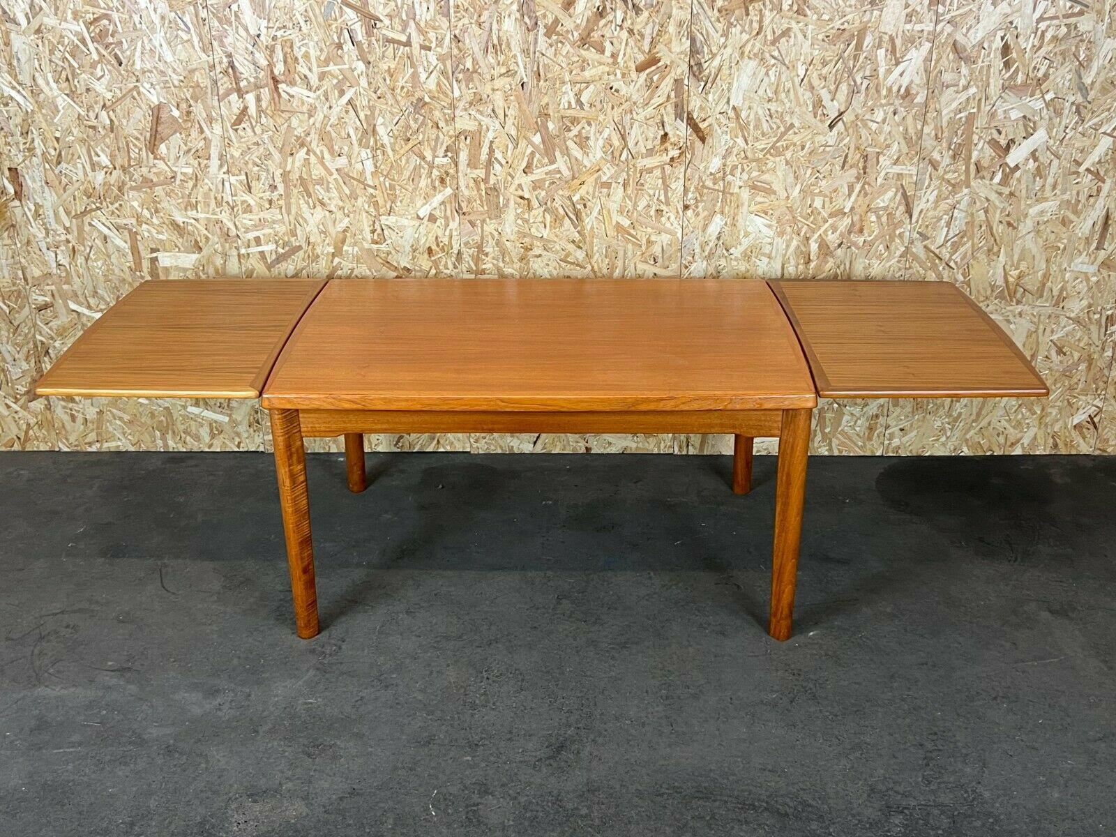 60s 70s teak coffee table Danish modern design Denmark 60s

Object: coffee table

Manufacturer:

Condition: good - vintage

Age: around 1960-1970

Dimensions:

120cm (+ 2x 48.5cm) x 80cm x 63.5cm

Other notes:

The pictures serve as