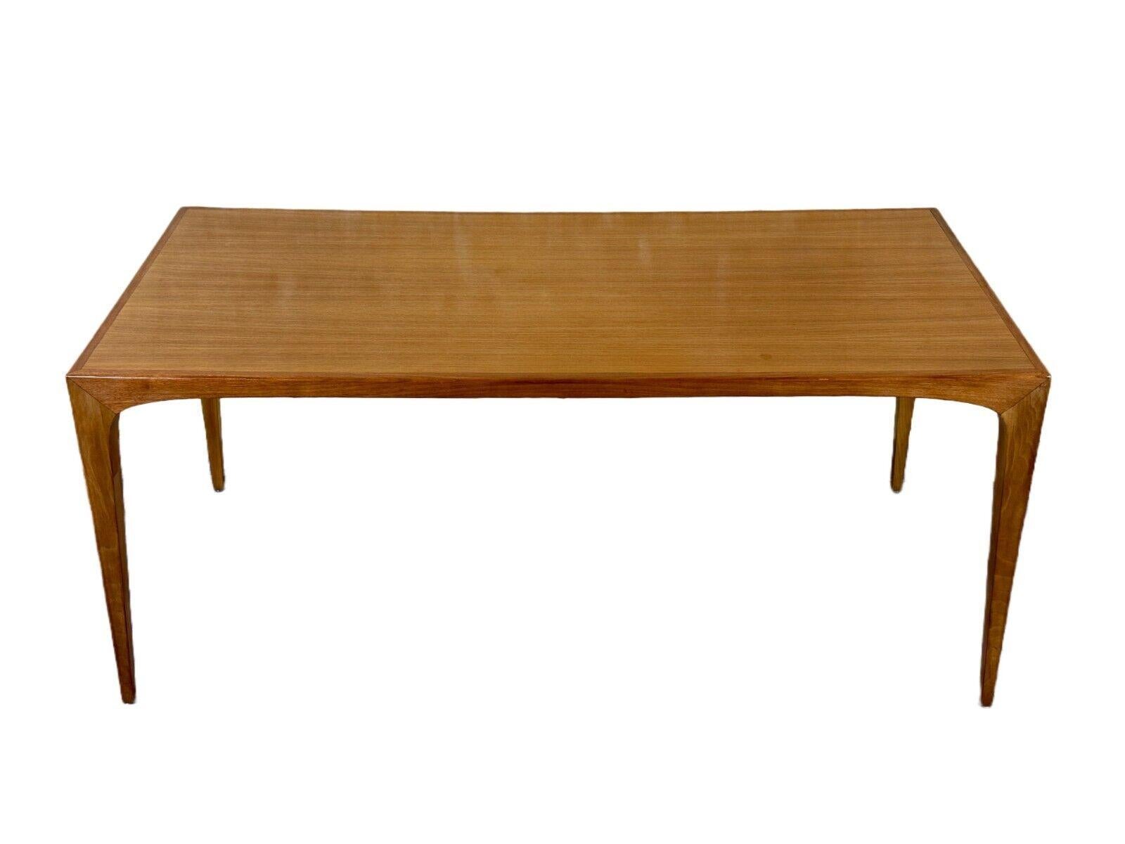 60s 70s teak coffee table side table Danish Modern Design Denmark

Object: coffee table

Manufacturer:

Condition: good

Age: around 1960-1970

Dimensions:

Width = 140cm
Depth = 70cm
Height = 60.5cm

Material: teak

Other notes:

The pictures serve
