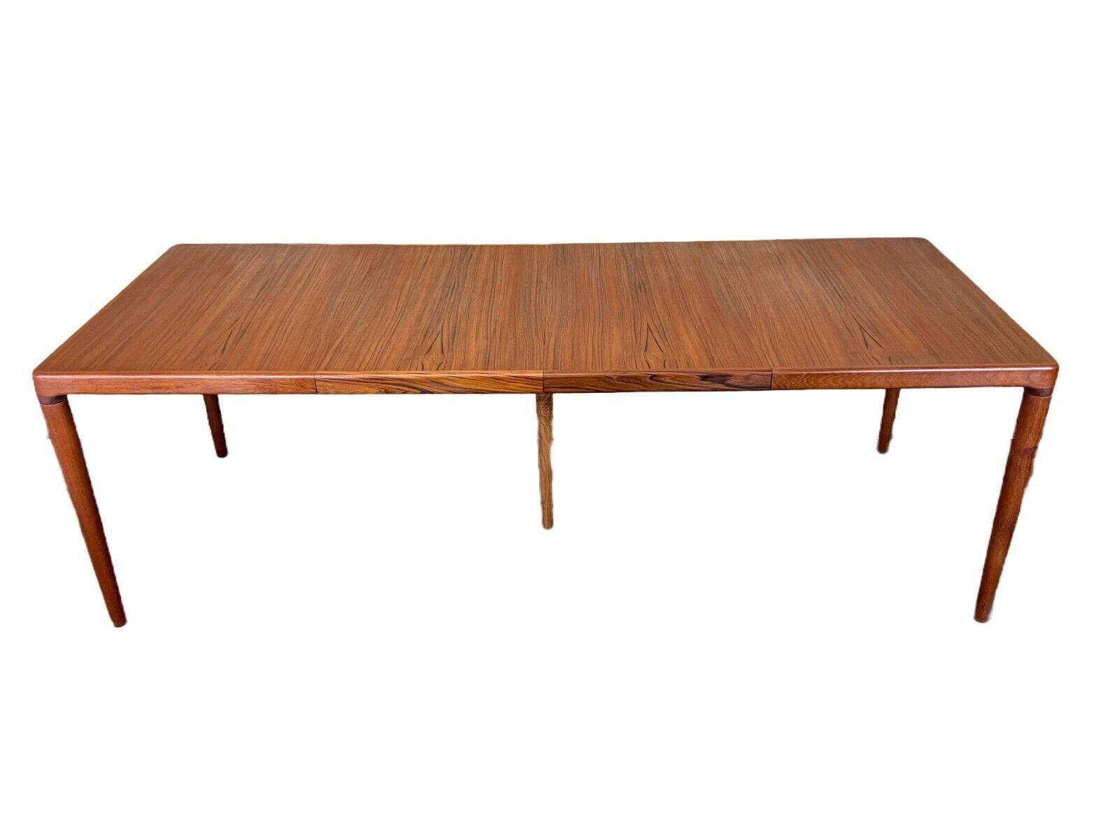 60s 70s teak dining table Danish Modern Design Denmark 60s 70s

Object: dining table / dining table

Manufacturer:

Condition: good - vintage

Age: around 1960-1970

Dimensions:

Width = 225.5cm
Depth = 90cm
Height = 72.5cm
Insert