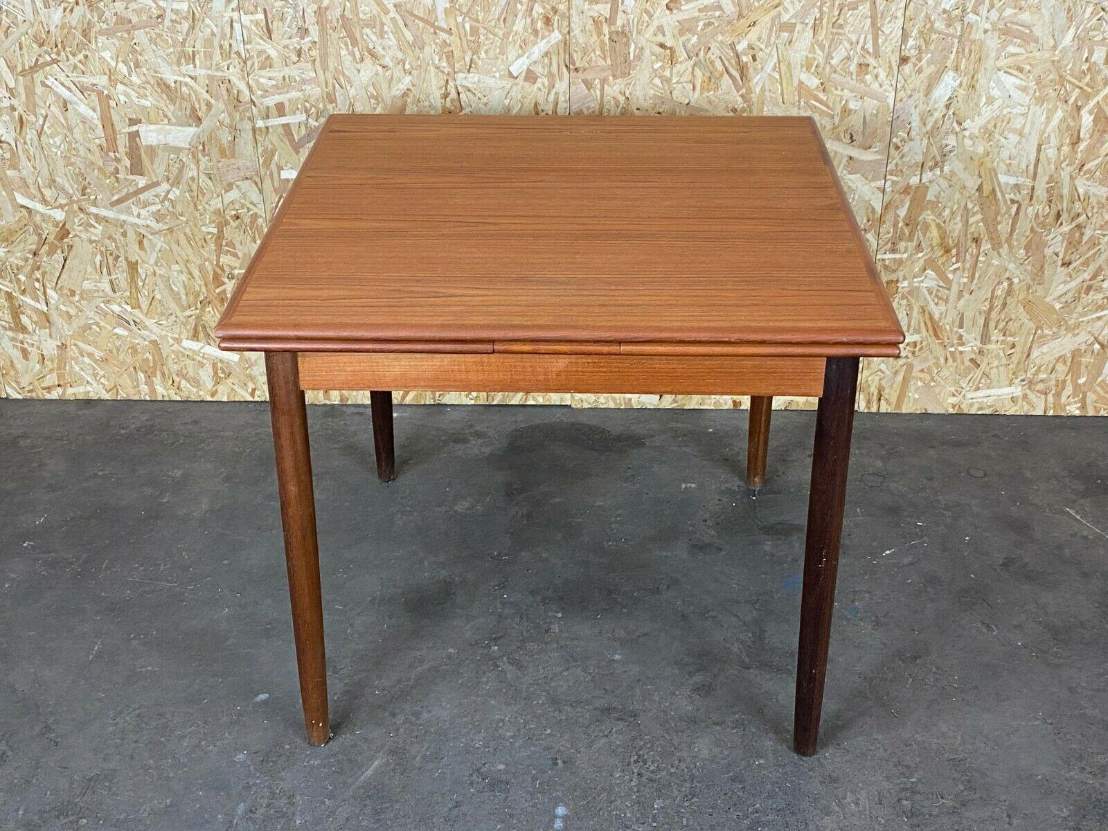 60s 70s teak dining table Dining Table Danish Modern Design Denmark 60s 70s

Object: dining table / dining table

Manufacturer:

Condition: good - vintage

Age: around 1960-1970

Dimensions:

(+ 2x 35cm) 86.5cm x 86.5cm x 75cm

Other