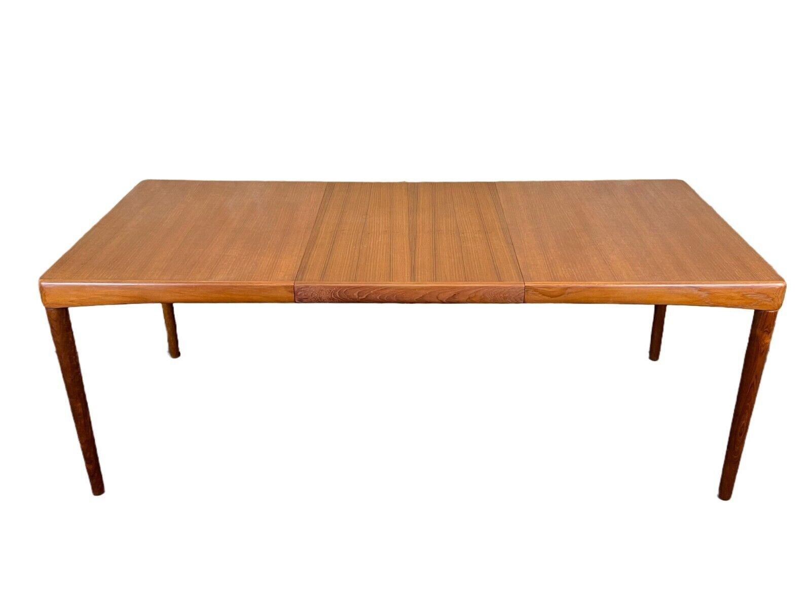 60s 70s teak dining table Dining Table H.W Klein for Bramin Danish Design

Object: dining table

Manufacturer: Bramin

Condition: good

Age: around 1960-1970

Dimensions:

Width = 195cm
Depth = 89.5cm
Height = 71.5cm
Insert plate = 60cm

Other