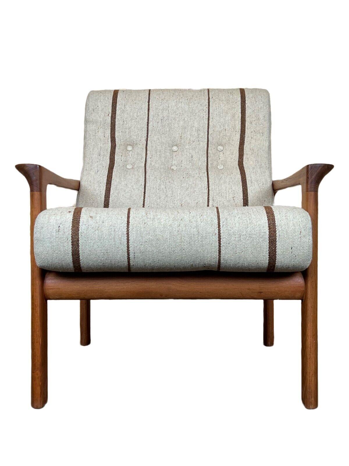 60s 70s teak easy chair Sven Ellekaer for Komfort Design Denmark

Object: Easy Chair

Manufacturer: comfort

Condition: good - vintage

Age: around 1960-1970

Dimensions:

Width = 76cm
Depth = 82cm
Height = 82cm
Seat height =