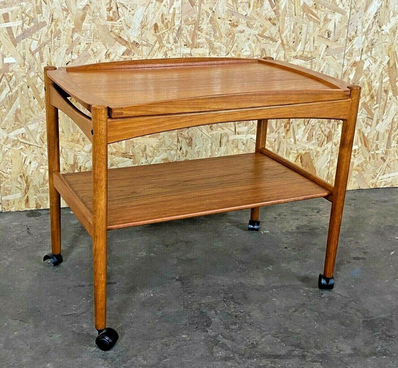 60s 70s teak serving trolley side table Danish Design Denmark

Object: Serving trolley

Manufacturer:

Condition: good

Age: around 1960-1970

Dimensions:

73cm x 43cm x 60cm

Other notes:

The pictures serve as part of the