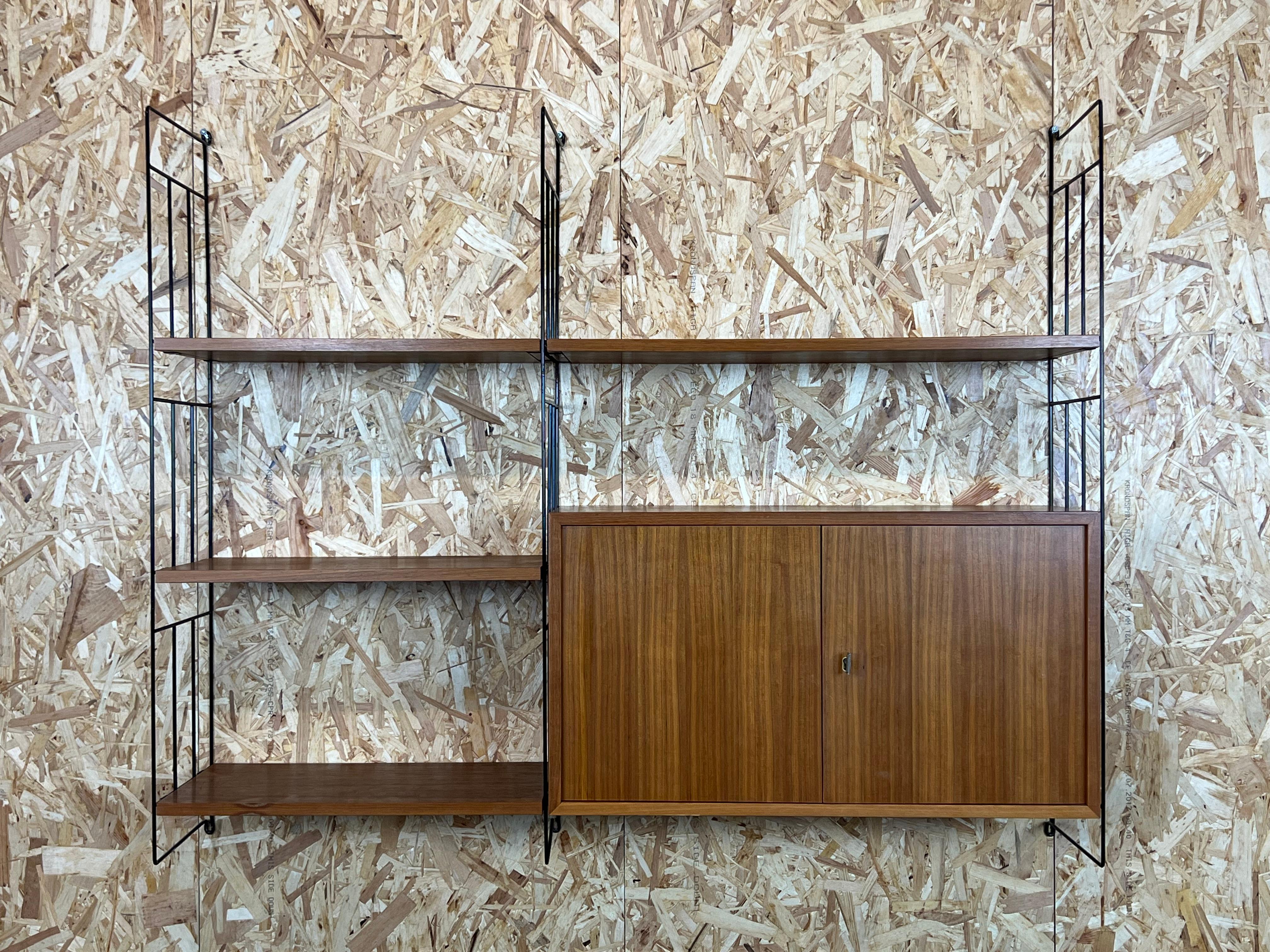 60s 70s teak shelf wall shelf WHB Germany string shelf Danish design

Object: wall shelf

Manufacturer: WHB

Condition: good

Age: around 1960-1970

Dimensions:

123.5cm x 26.5cm x 102cm

Other notes:

The pictures serve as part of
