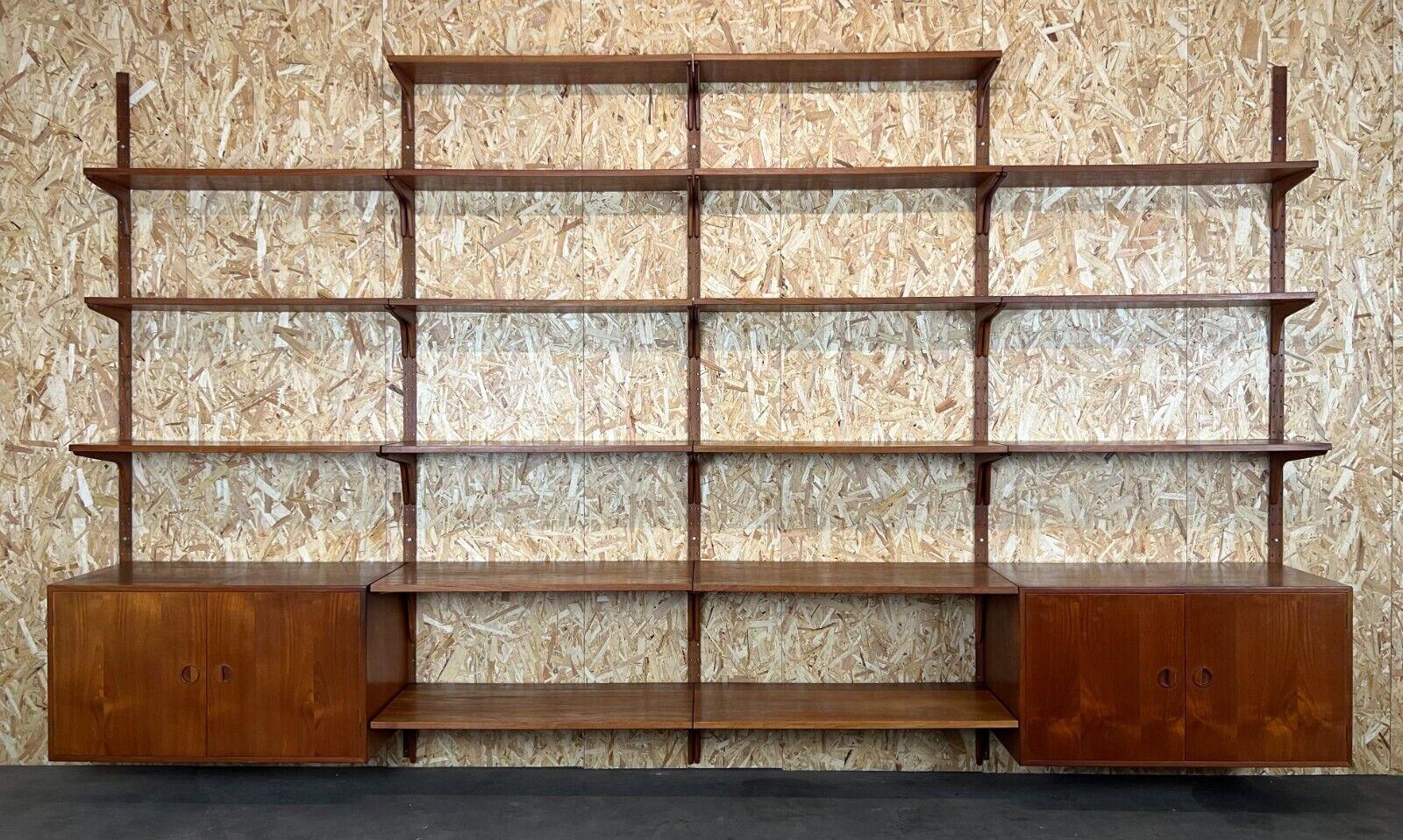 60s 70s teak shelving system Thygesen & Sørensen for HG Furniture Denmark

Object: wall unit

Manufacturer: HG Furniture

Condition: good

Age: circa 1960-1970

Dimensions:

Width = 360cm
Height = 216cm
Depth = 41.5cm

Other