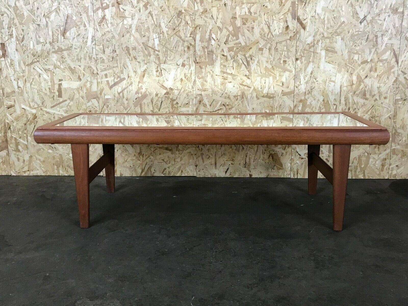 60s 70s Teak table coffee table Danish design with mirror 60s.

Object: coffee table

Manufacturer:

Condition: good

Age: around 1960-1970

Dimensions:

158.5cm x 58cm x 48cm

Other notes:

The pictures serve as part of the