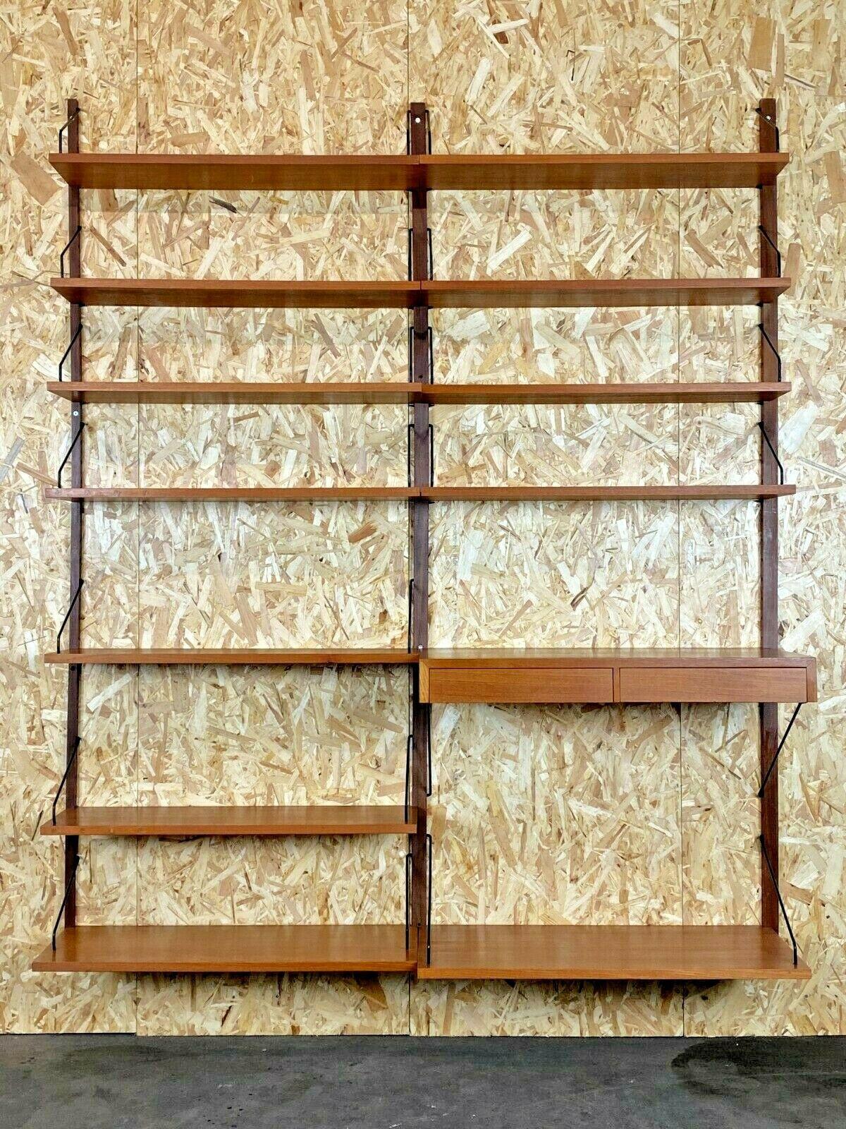 60s 70s Teak shelf wall unit Cado Poul Cadovius Danish Design

Object: wall unit

Manufacturer: Cado

Condition: good

Age: around 1960-1970

Dimensions:

161cm x 40cm x 200cm

Other notes:

The pictures serve as part of the