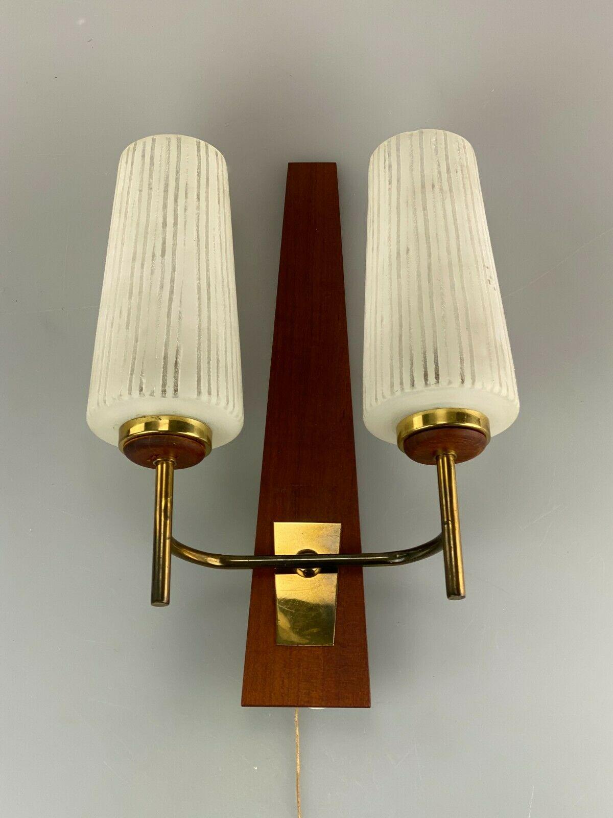 60s 70s Wall light wall lamp lamp wall bag lamp teak design 60s 70s

Object: wall lamp

Manufacturer:

Condition: good

Age: around 1960-1970

Dimensions:

34cm x 23.5cm x 13cm

Other notes:

The pictures serve as part of the