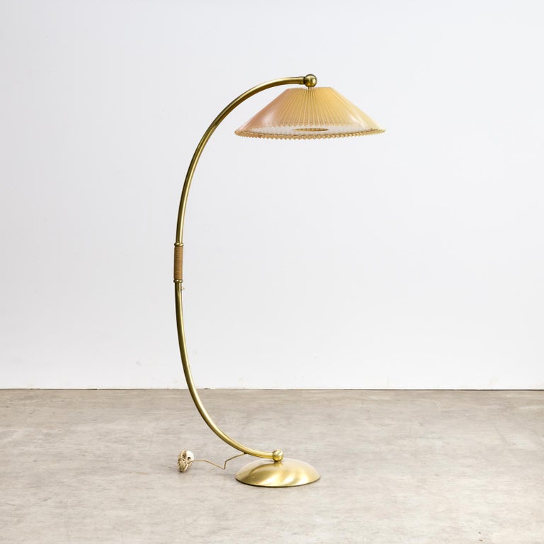 1960s Brass Arc Floor Lamp with Adjustable Celluloid Shade For Sale at