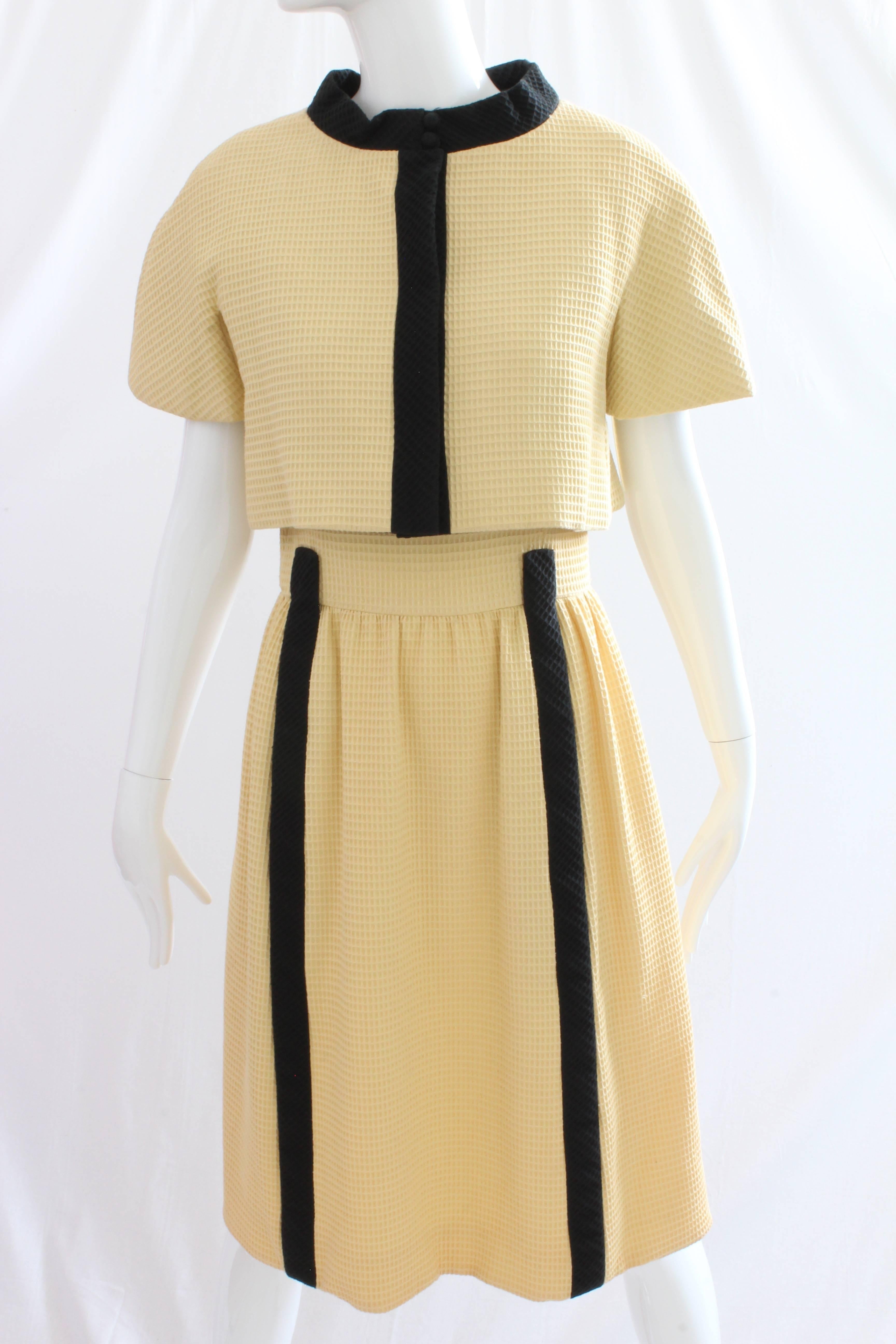 Here's a pretty 2pc dress set from Chester Weinberg, who once declared, 