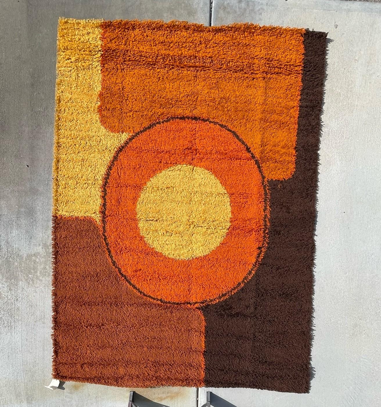 From a crazy collection that was kept in storage for decades!
All new UNUSED vintage 60's/70's Rugs!

DANIA TAEPPER Yellow Orange Circle Brown  Rya Rug

Creator: Dania Taepper

100% Authentic!!!



Condition: New with tags, unused vintage condition,