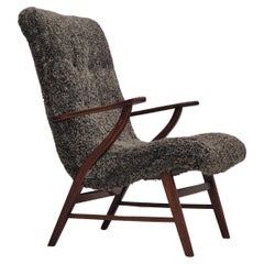 60s, Danish design, refurbished armchair, quality genuine sheepskin.