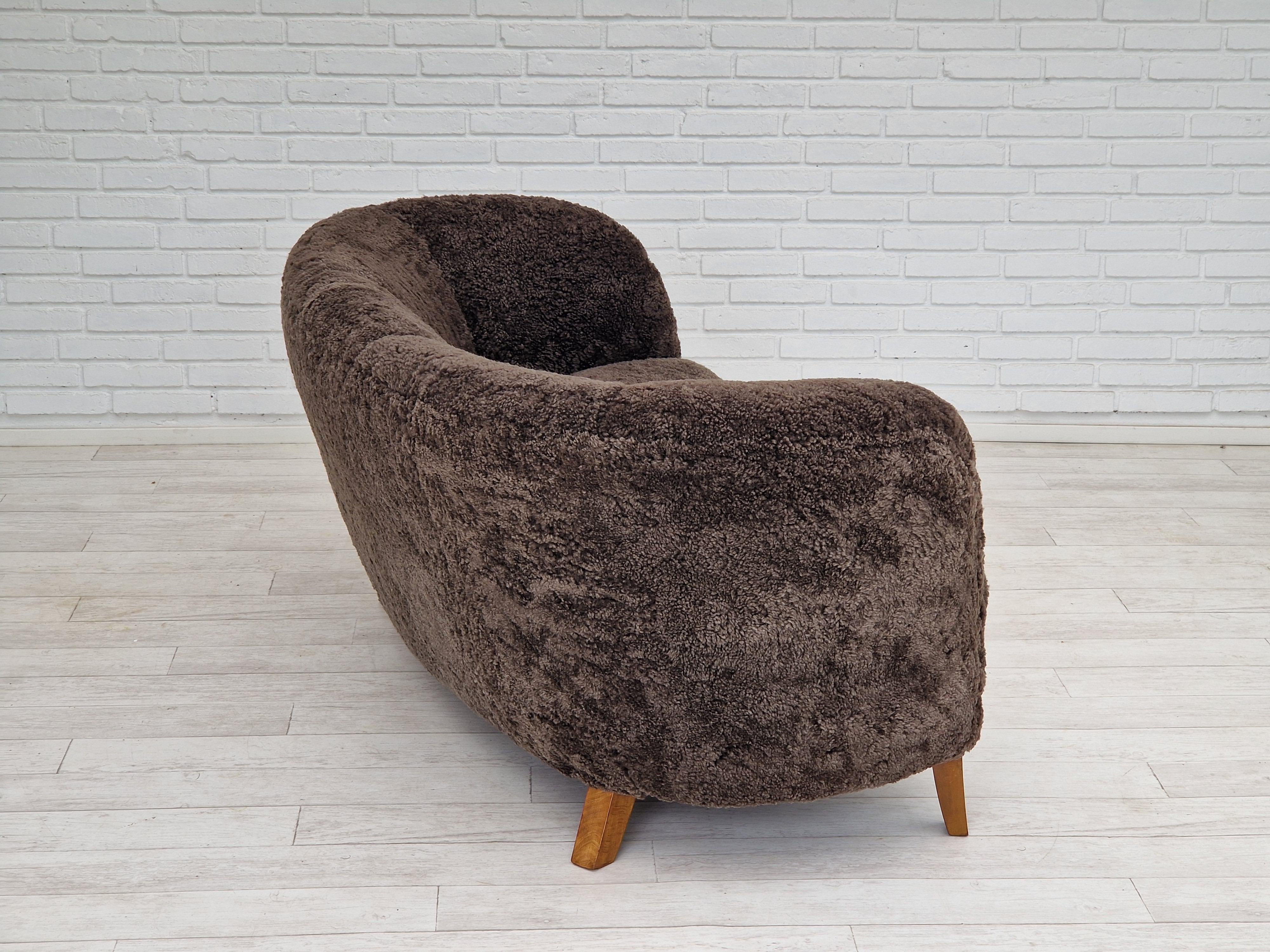 Cuir de mouton Des années 60, design danois, siège rénové 
