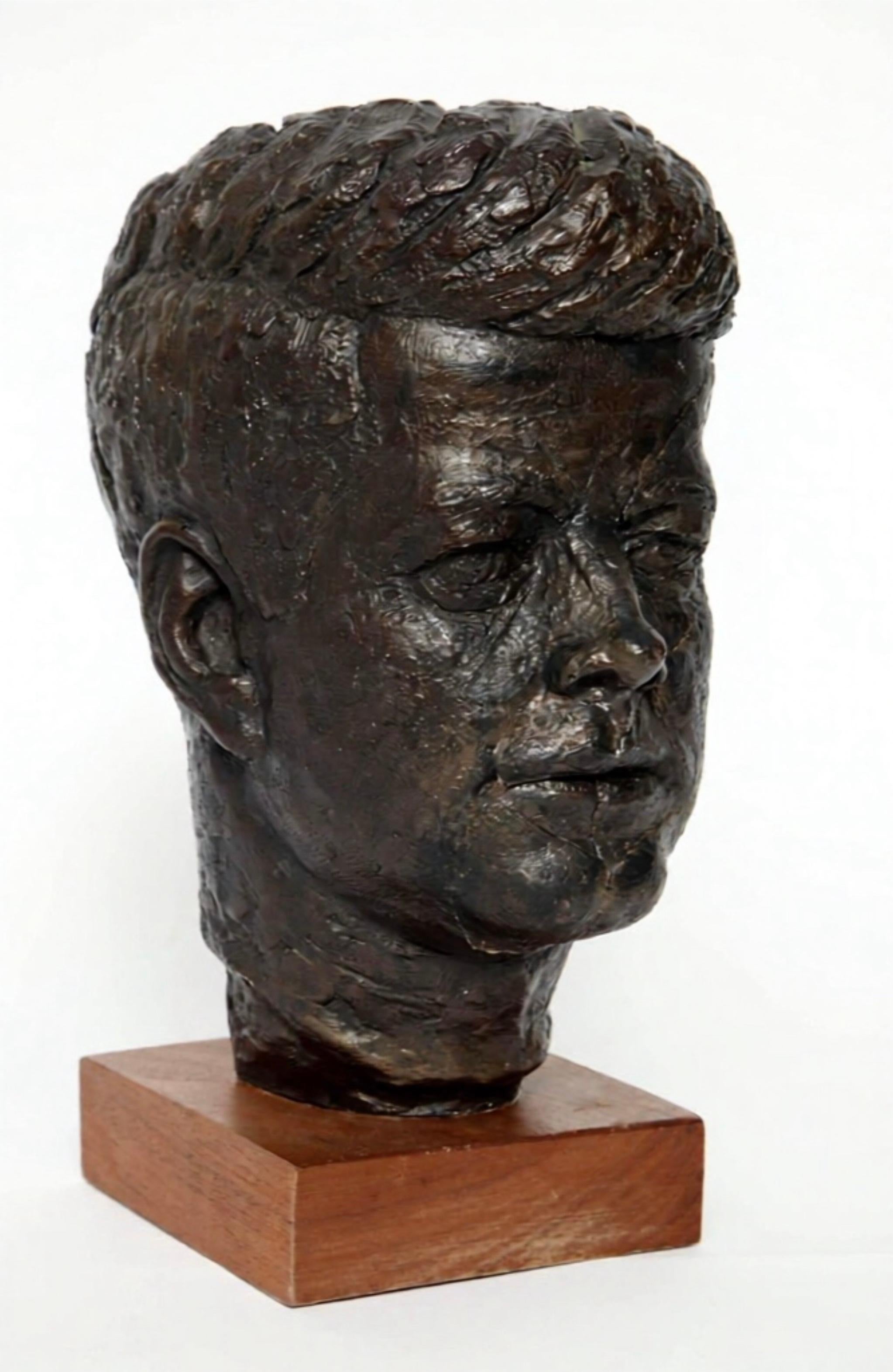 A Very stylized, Mid Century Modern, Historic bust, by sculptor John for  Schillaci, circa 1964, for Austin Productions. Scillaci, sculpted for Austin Prods during the 1950s and 1960s.  This. 1964 bust of John F. Kennedy is one of his notable works.
