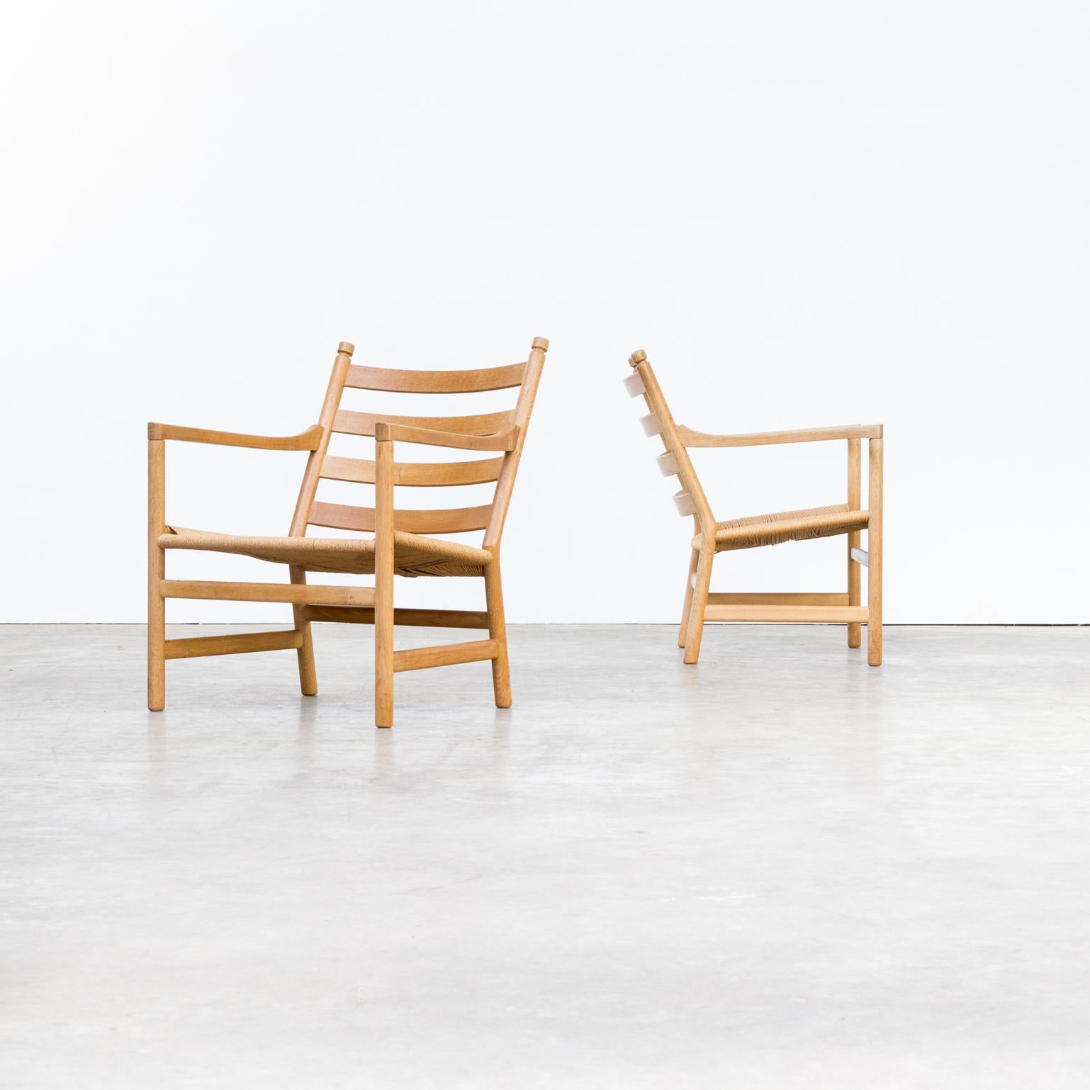1960s Hans Wegner ‘CH44’ fauteuils for Carl Hansen & Son set of 2. Good condition consistent with age and use.