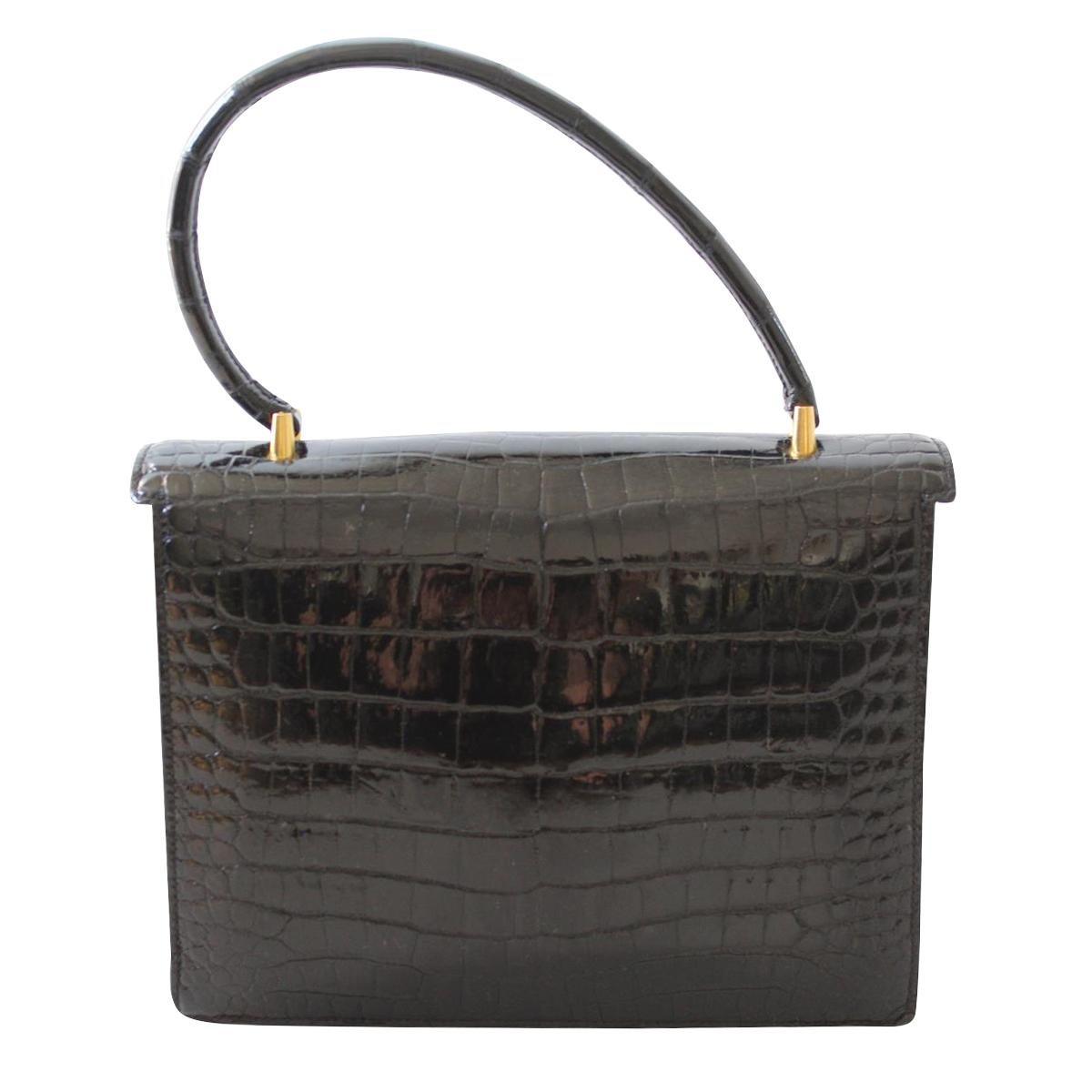 Fantastic Hermès bag
Vintage
'60s period
Real crocodile leather
Black color
Single handle
Golden metal
Two internal compartments
Four pockets
Cm 24 x 18 x 6 (9.4 x 7 x 2.3 inches)
With dustbag
Worldwide express shipping included in the price !