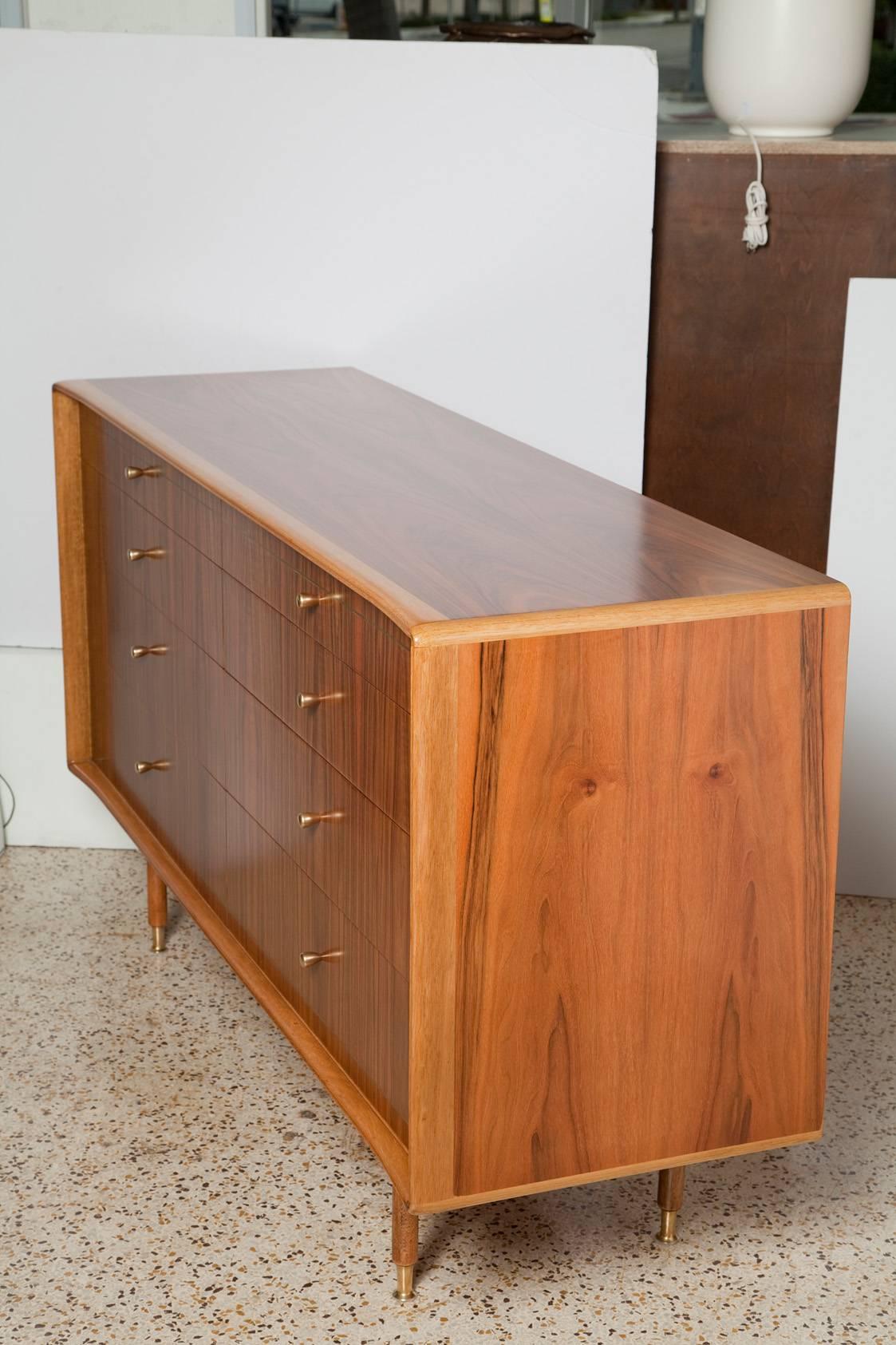 Fully restored 1960s Italian walnut dresser by Erno Fabry with solid brass hardware and inlays on drawer fronts.