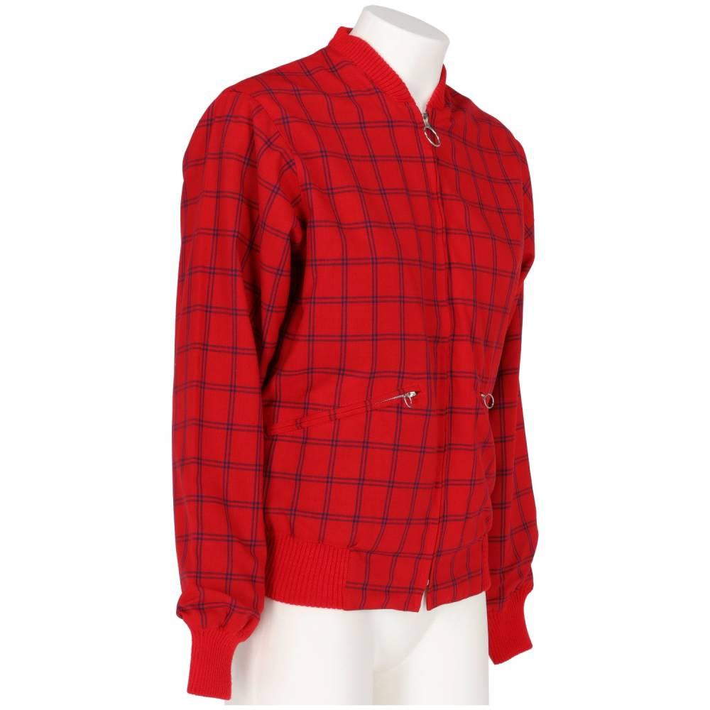 Johnny Guitar Creation red wool bomber-style crop jacket featuring a blue check pattern. Ribbed wool knit collar and cuffs, front zip fastening and front welt pockets with zip.

Years: 60s
Size: S

Flat measurements
Height: 60 cm
Bust: 48