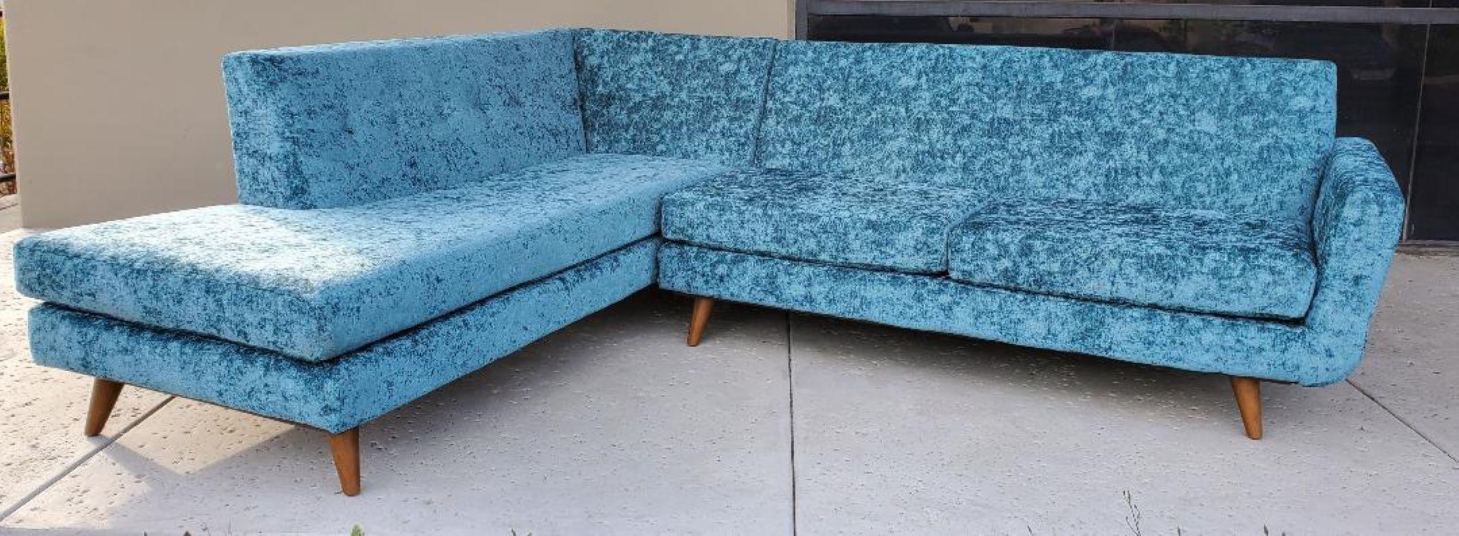 1960s Low Slung Style Sectional With Thick Wooden Tapered Legs And Aqua Green Crushed Velvet Upholstery.
This Is A Gorgeous Aqua Green Velvet Upholstered 2 Piece Streamline Style Sofa, Which Represents The Comfort, The Style And The Iconic Dramatic