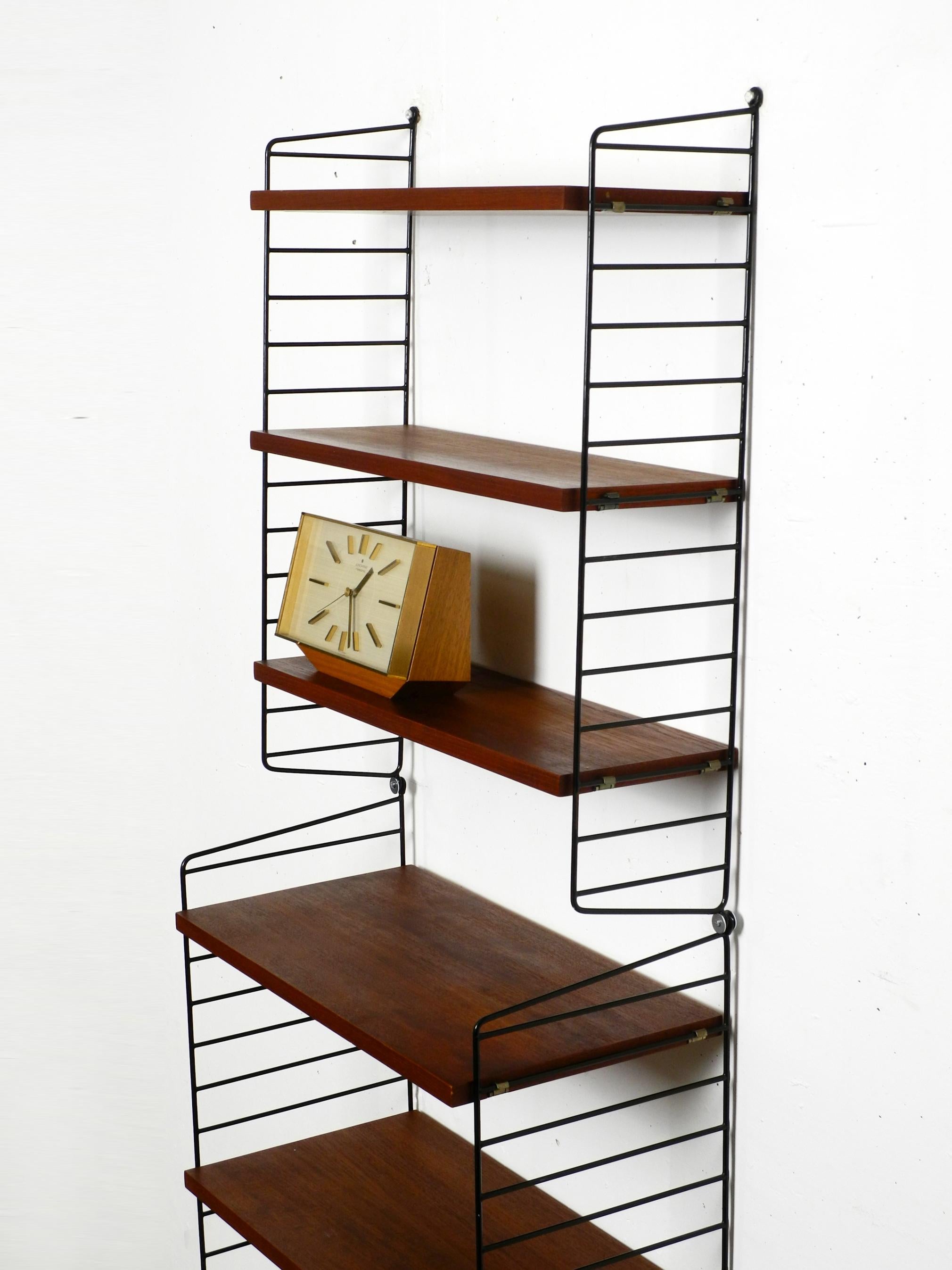 60s Nisse Strinning dark teak string shelf with six shelves and four ladders 4