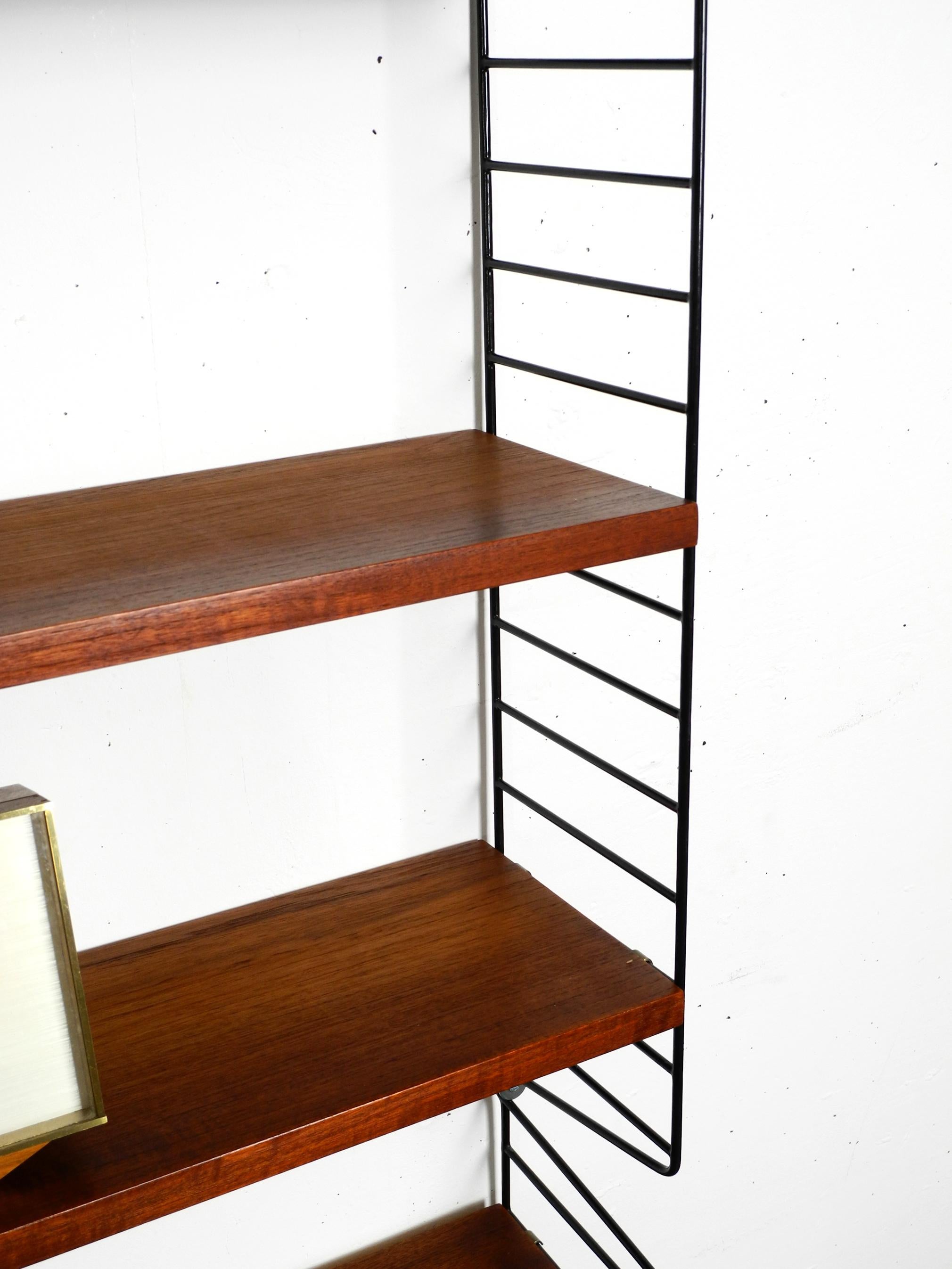 60s Nisse Strinning dark teak string shelf with six shelves and four ladders 5