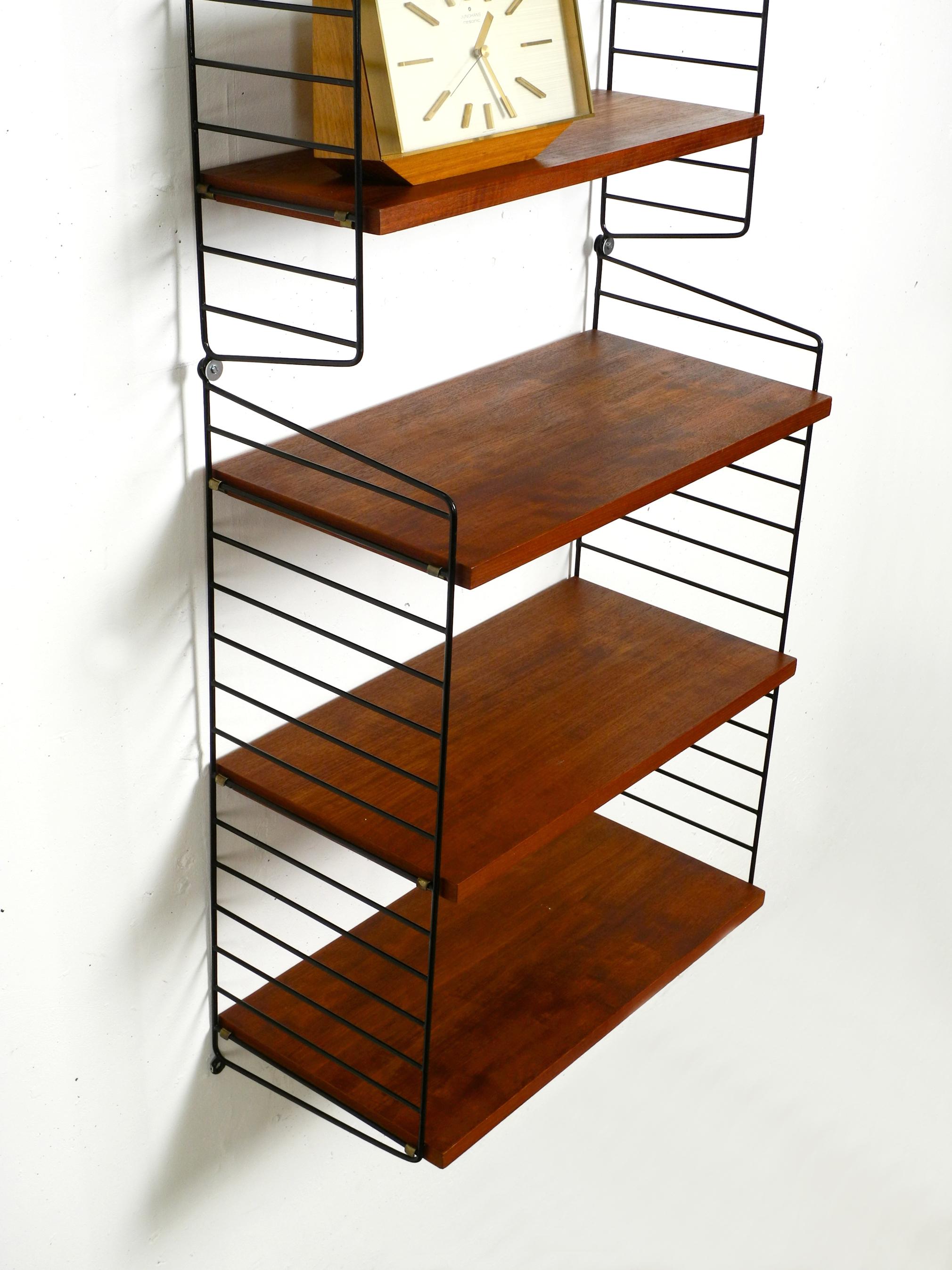 60s Nisse Strinning dark teak string shelf with six shelves and four ladders 8