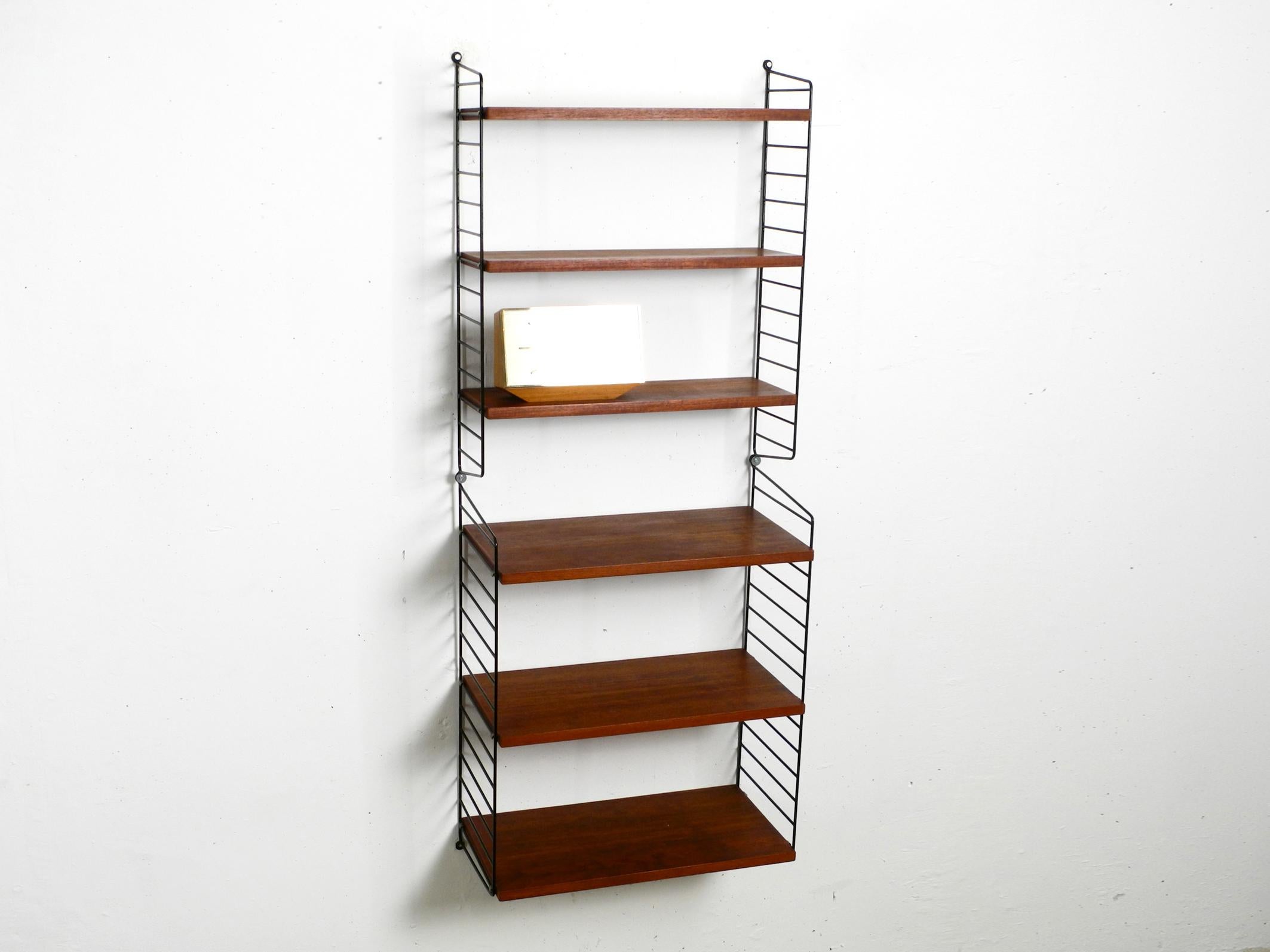 60s Nisse Strinning dark teak string shelf with six shelves and four ladders 12
