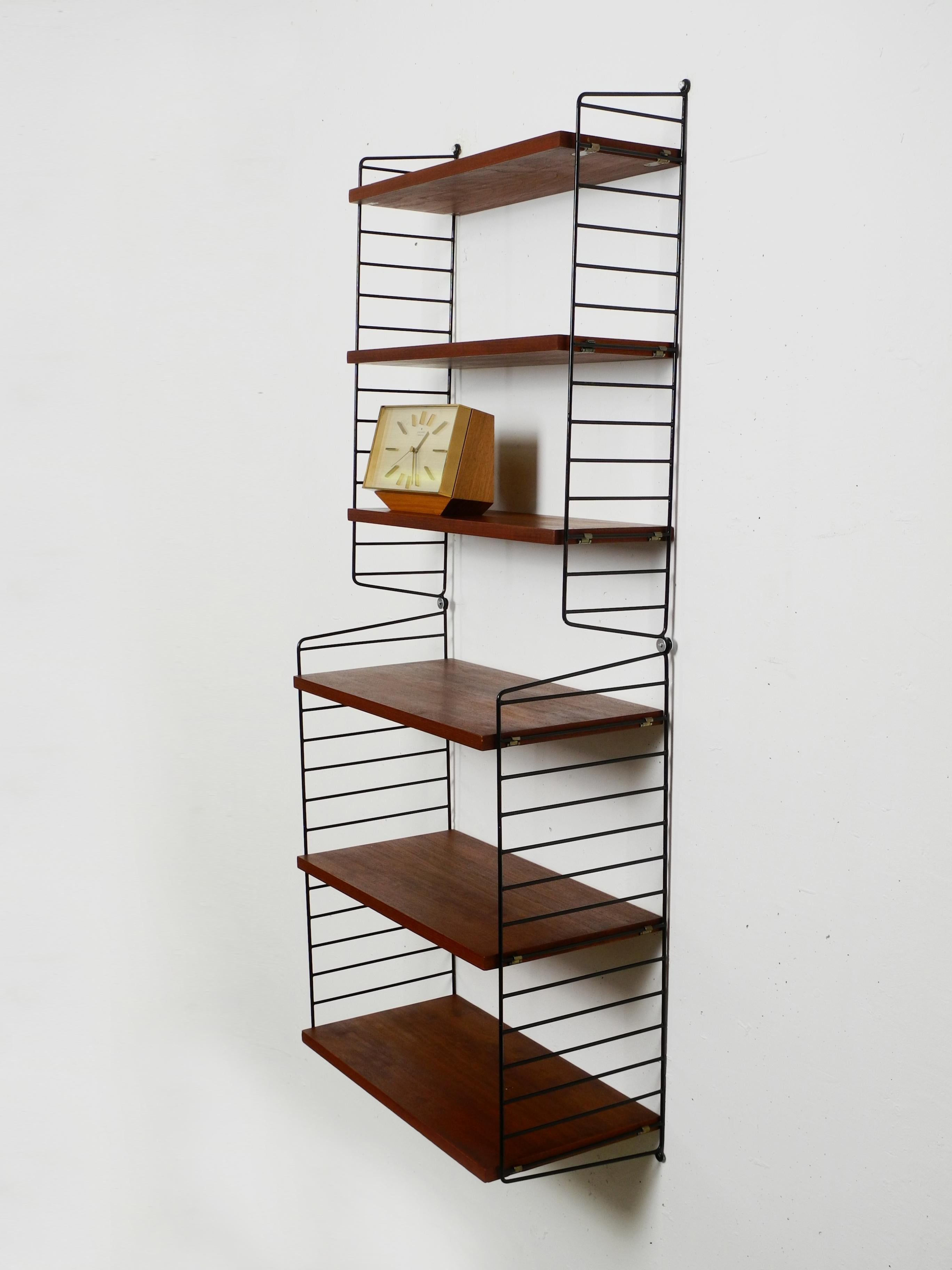 60s Nisse Strinning dark teak string shelf with six shelves and four ladders In Good Condition In München, DE
