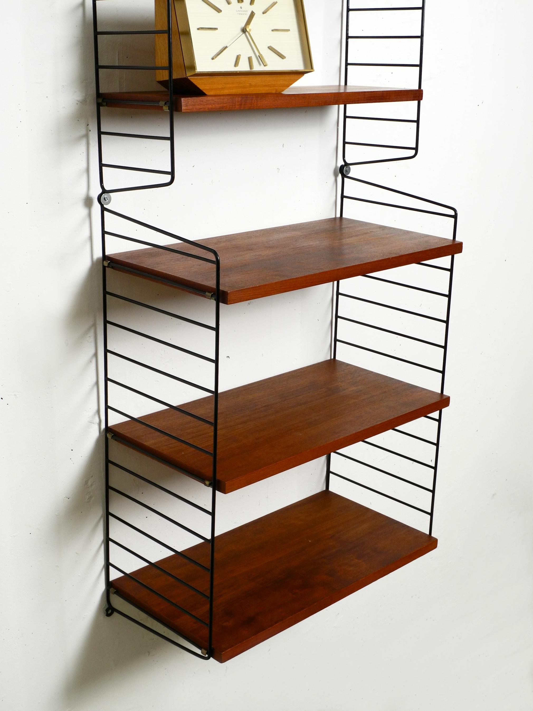 60s Nisse Strinning dark teak string shelf with six shelves and four ladders 2