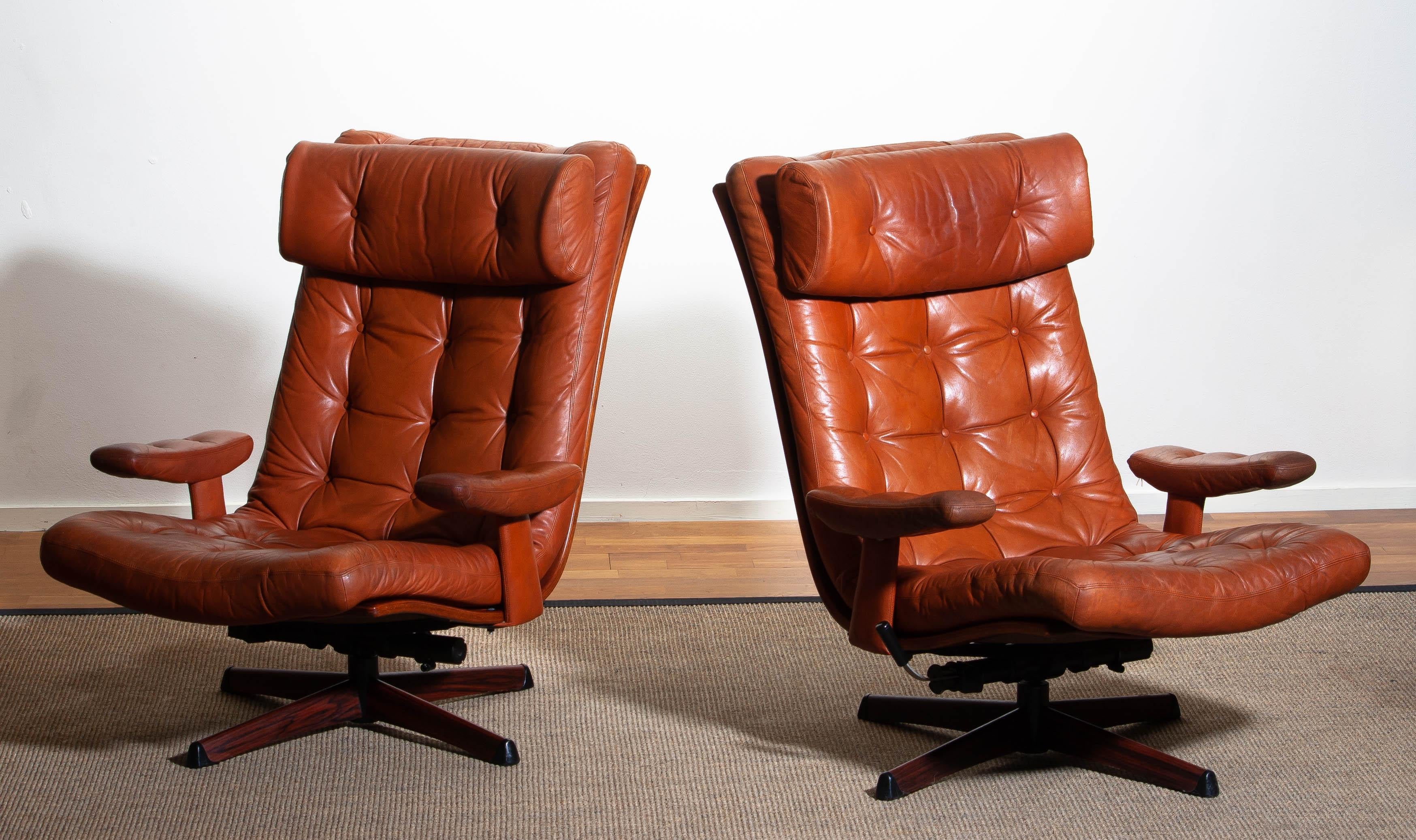 Swedish Pair of Cognac Leather Swivel / Relax Lounge Easy Chairs by Göte Design Nässjö