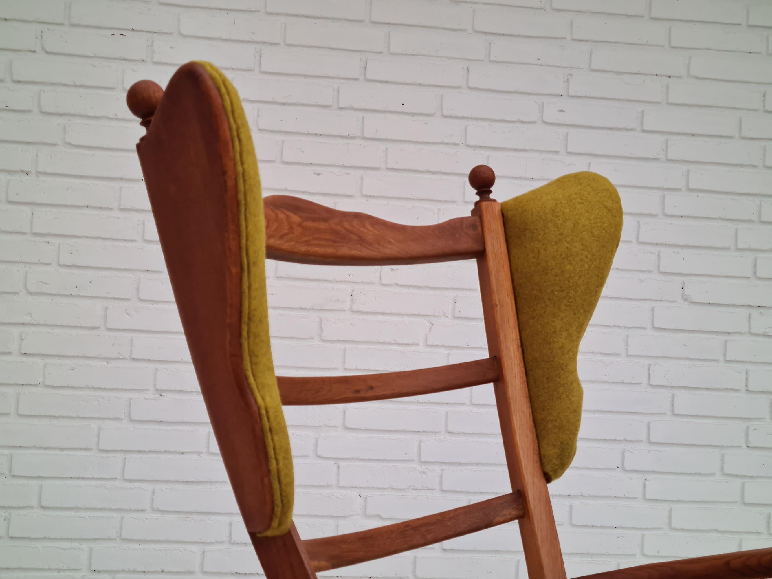60s, reupholstered Danish high-backed ear flap chair, solid oak, furniture wool 5