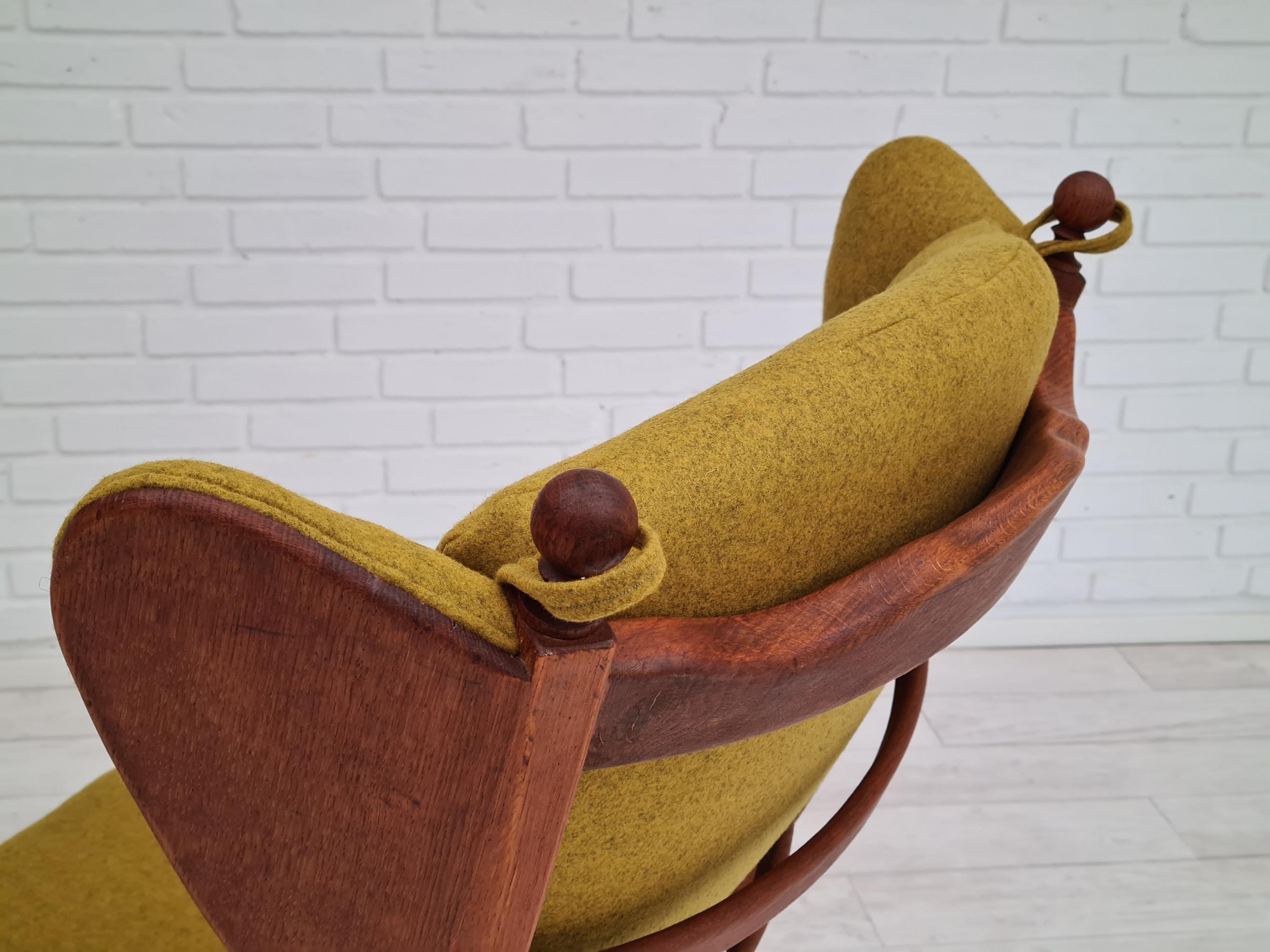 Scandinavian Modern 60s, reupholstered Danish high-backed ear flap chair, solid oak, furniture wool
