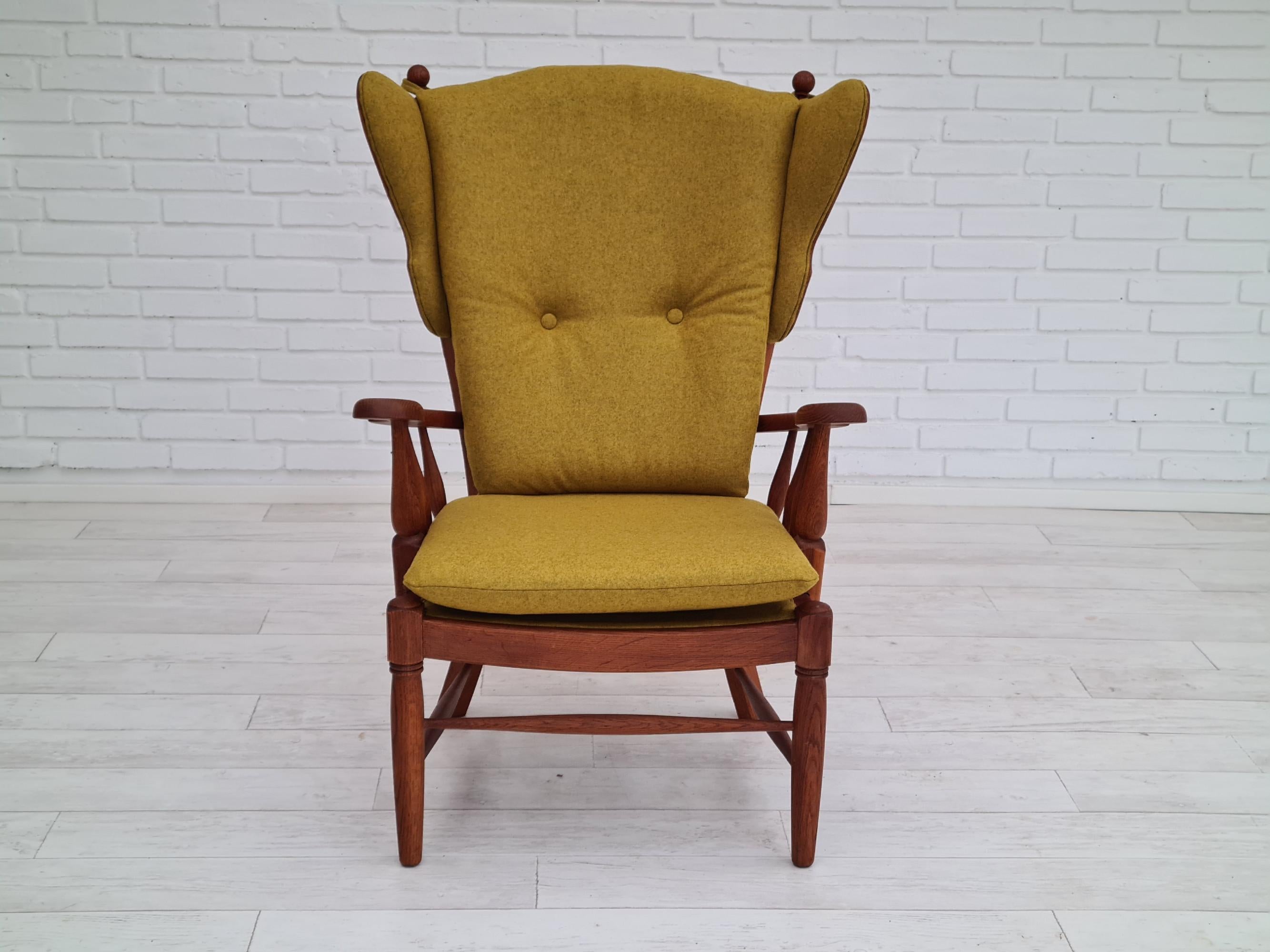 60s, reupholstered Danish high-backed ear flap chair, solid oak, furniture wool In Excellent Condition In Tarm, 82