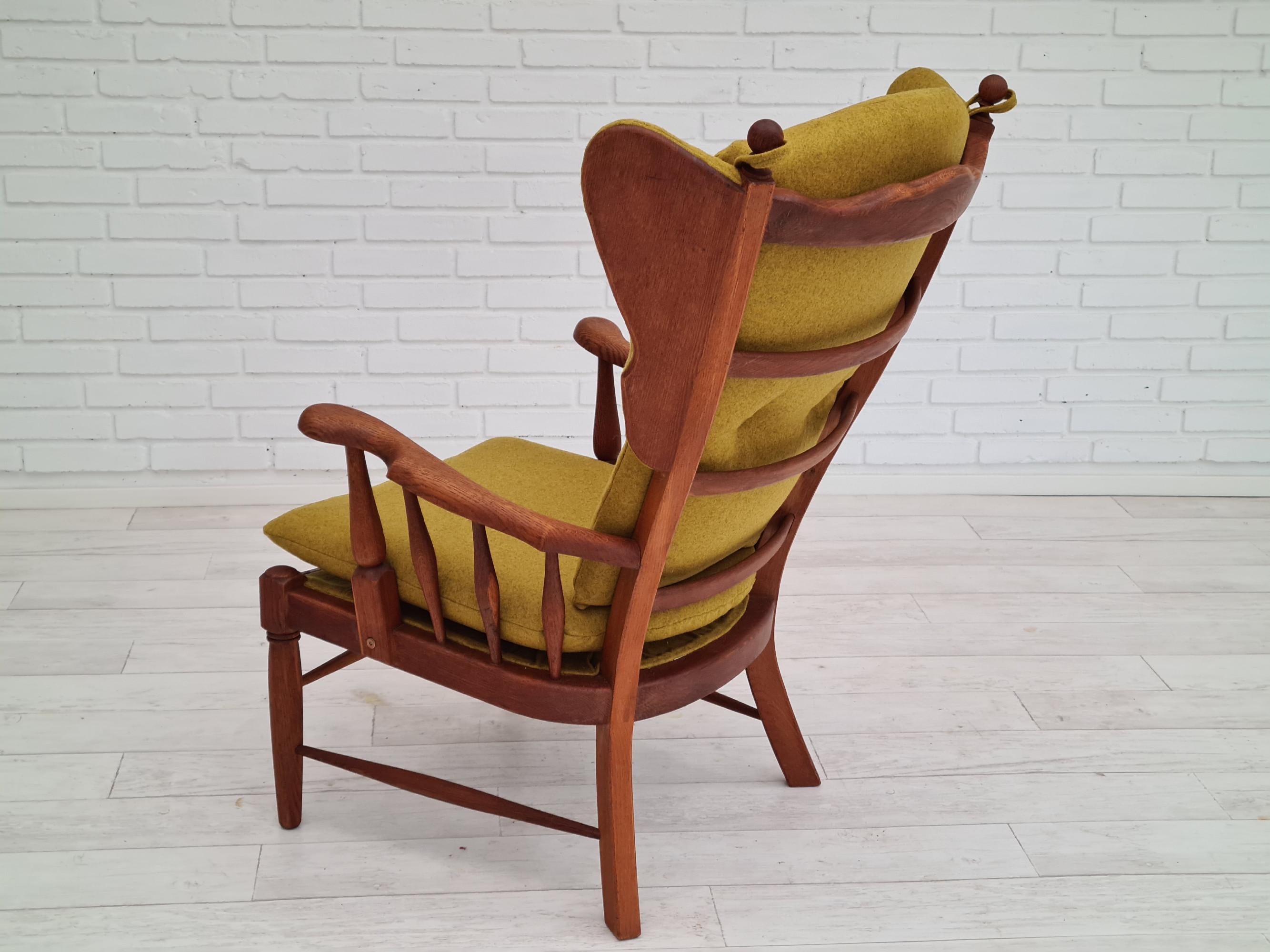 Mid-20th Century 60s, reupholstered Danish high-backed ear flap chair, solid oak, furniture wool